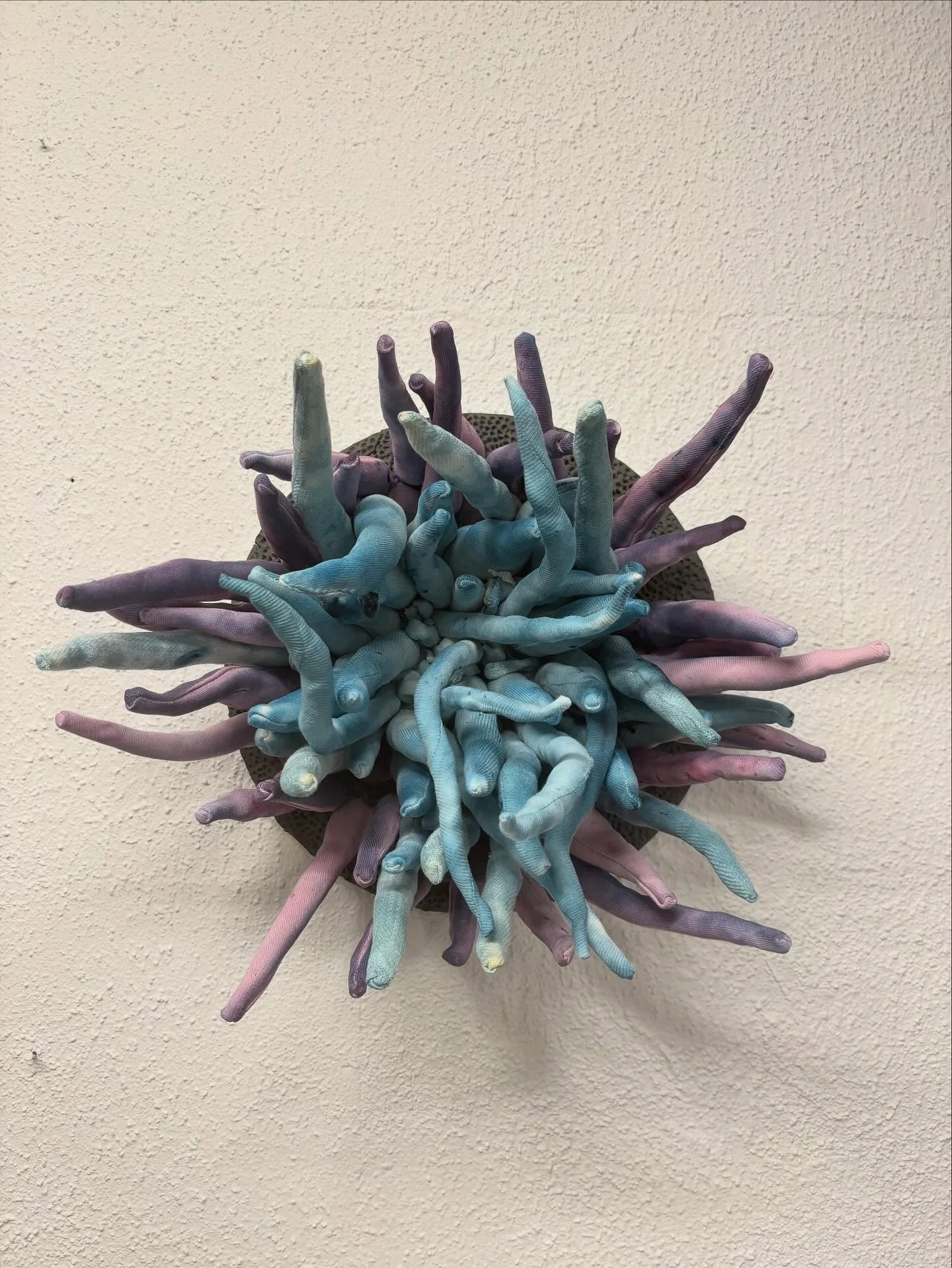 What do you do with your torn up clothes and sheeted? -I make tekstile art with it. After too many mistakes with the ceramics, I wanted to try something way more sustainable than turning on a kiln. 
This first eksempel is a drama queen a wall hanging