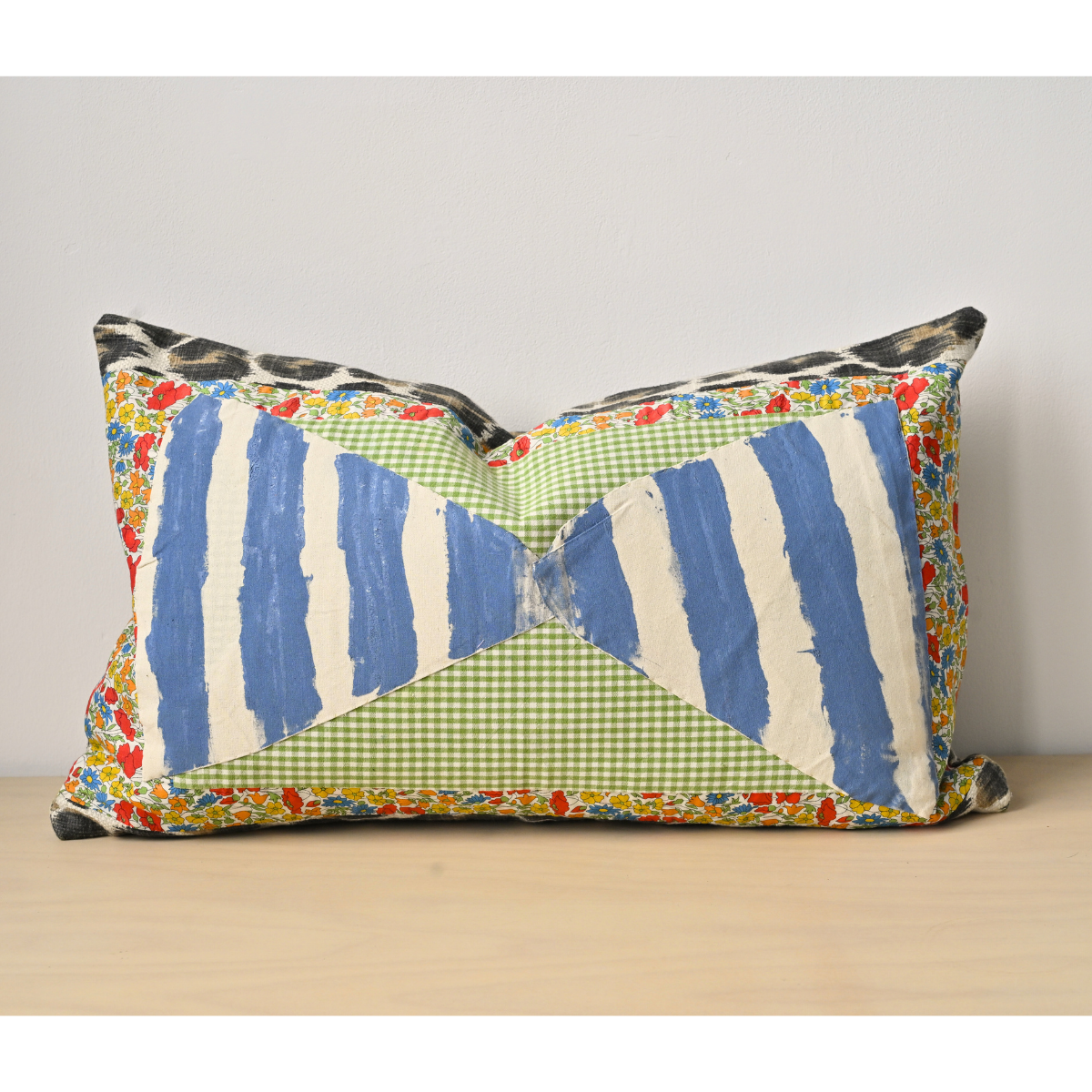 Blue Striped Bow Cushion by VICKY PYLORIDES