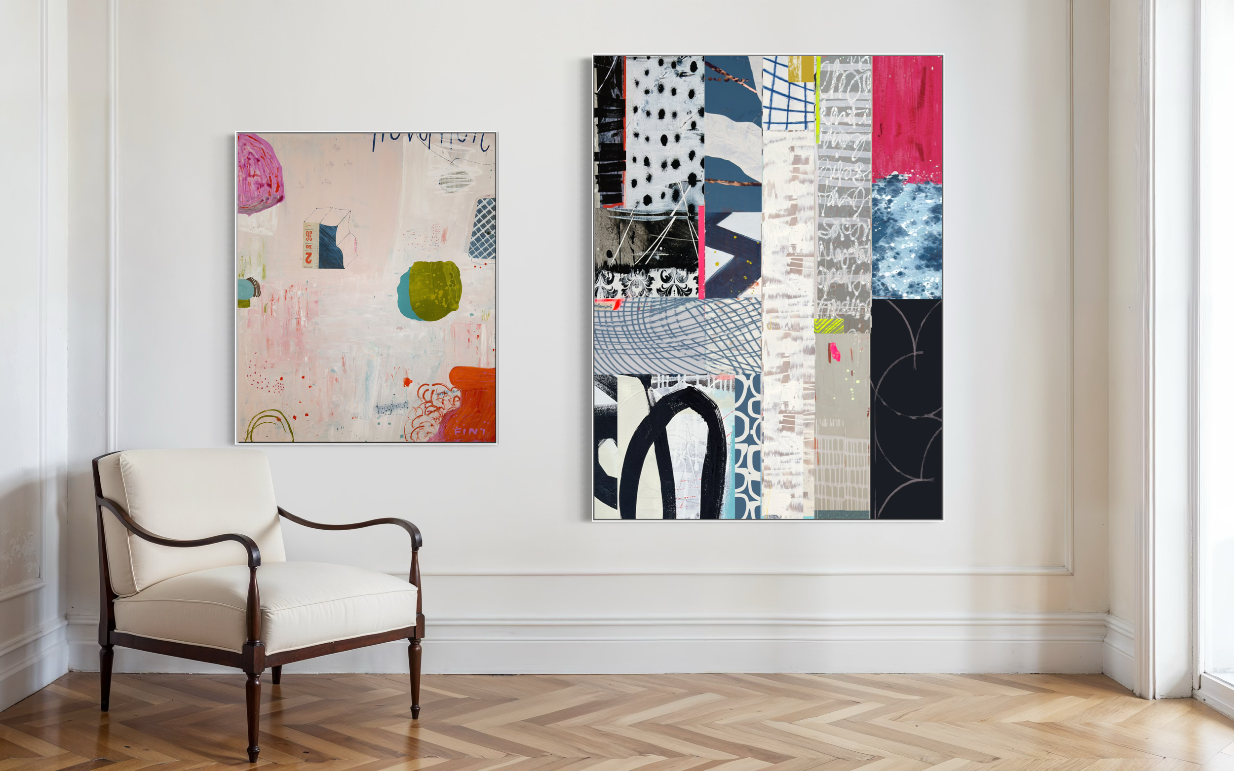 An art gallery corner with two abstract paintings on the wall and a white armchair with wooden arms and legs.
