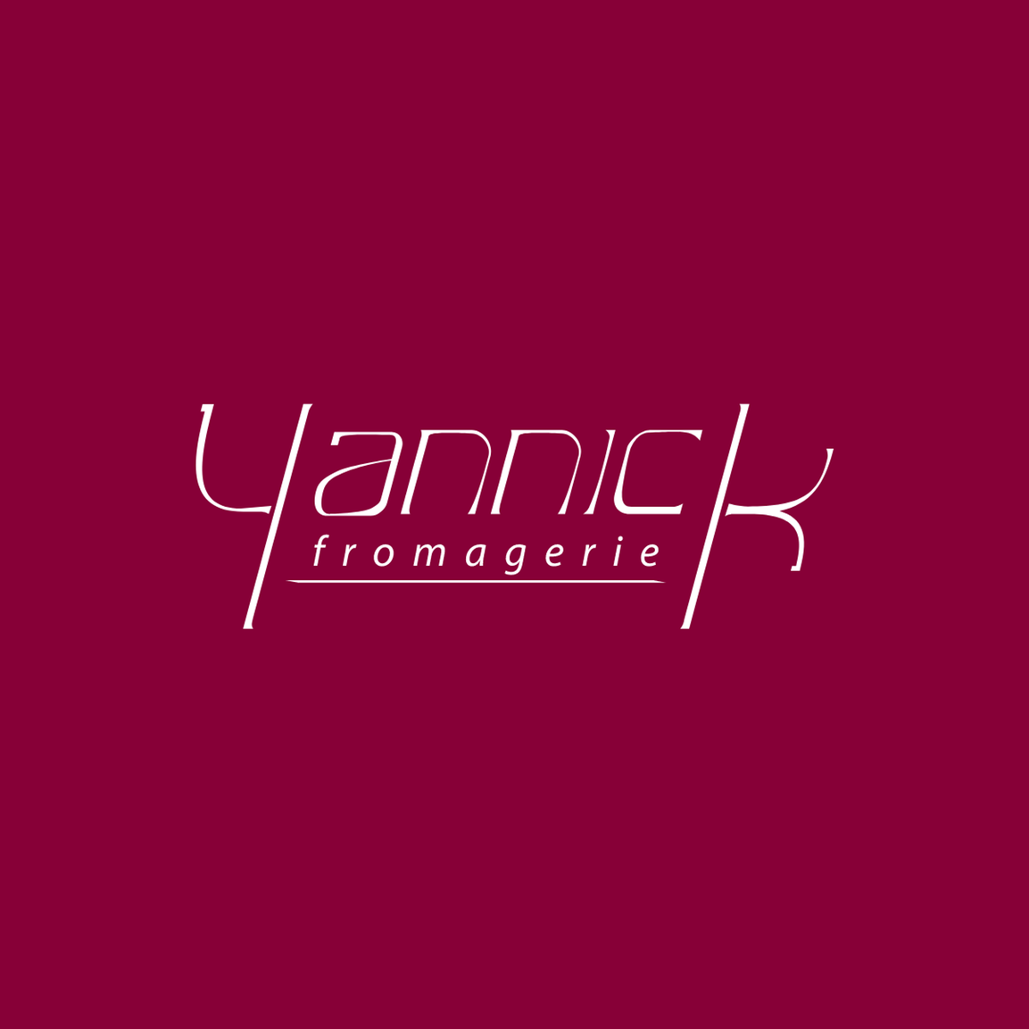 Logo de Yammik Fromagerie sur fond bordeaux.