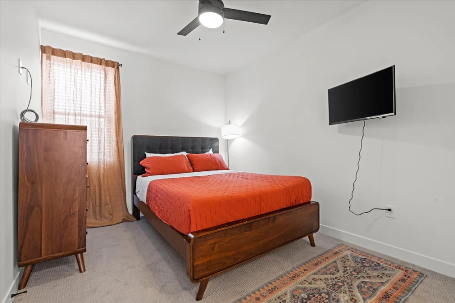 furnished bedroom of monthly rental property