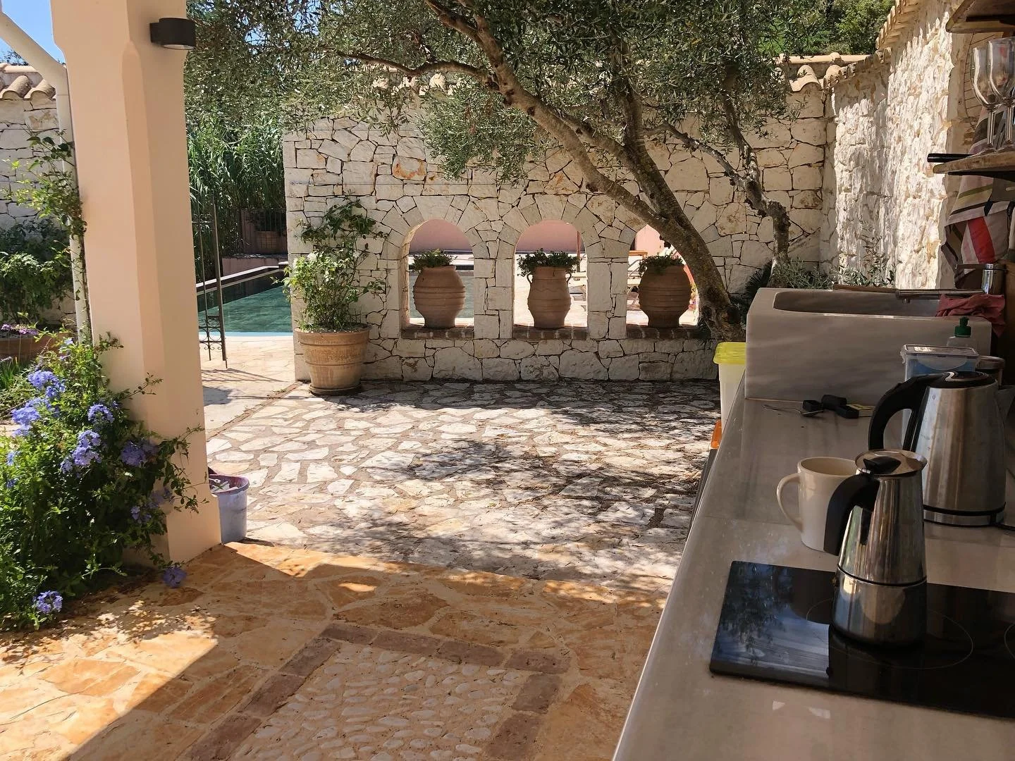 Coffee before swim 

#corfu #housewithaview #outdoorkitchen #poolside