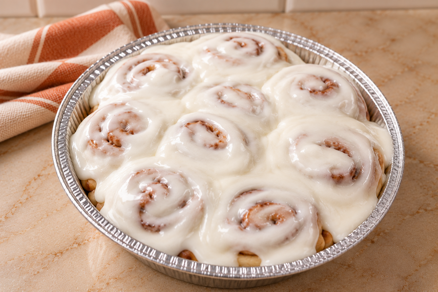 Iced Cinnamon Rolls in a Foil Pan.png