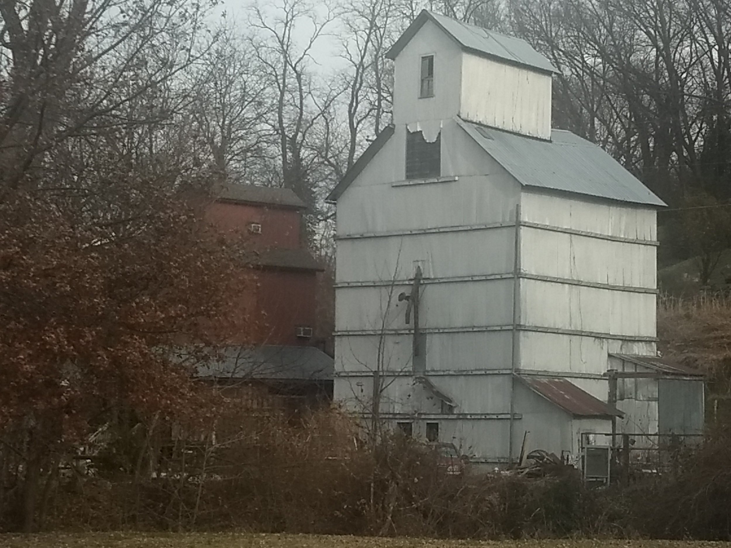 Where Perry B Mill stood burned in 1915. Today the Weston Elevator fills the space.