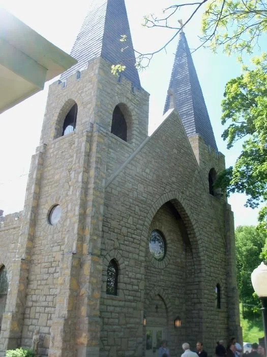 Holy Trinity Catholic Church -
Catholicism first came to Weston by way of the Kickapoo Mission across the river in Kansas territory, circa 1842. First church structure completed in 1847.. In 1912 local builder constructed the large stone church with