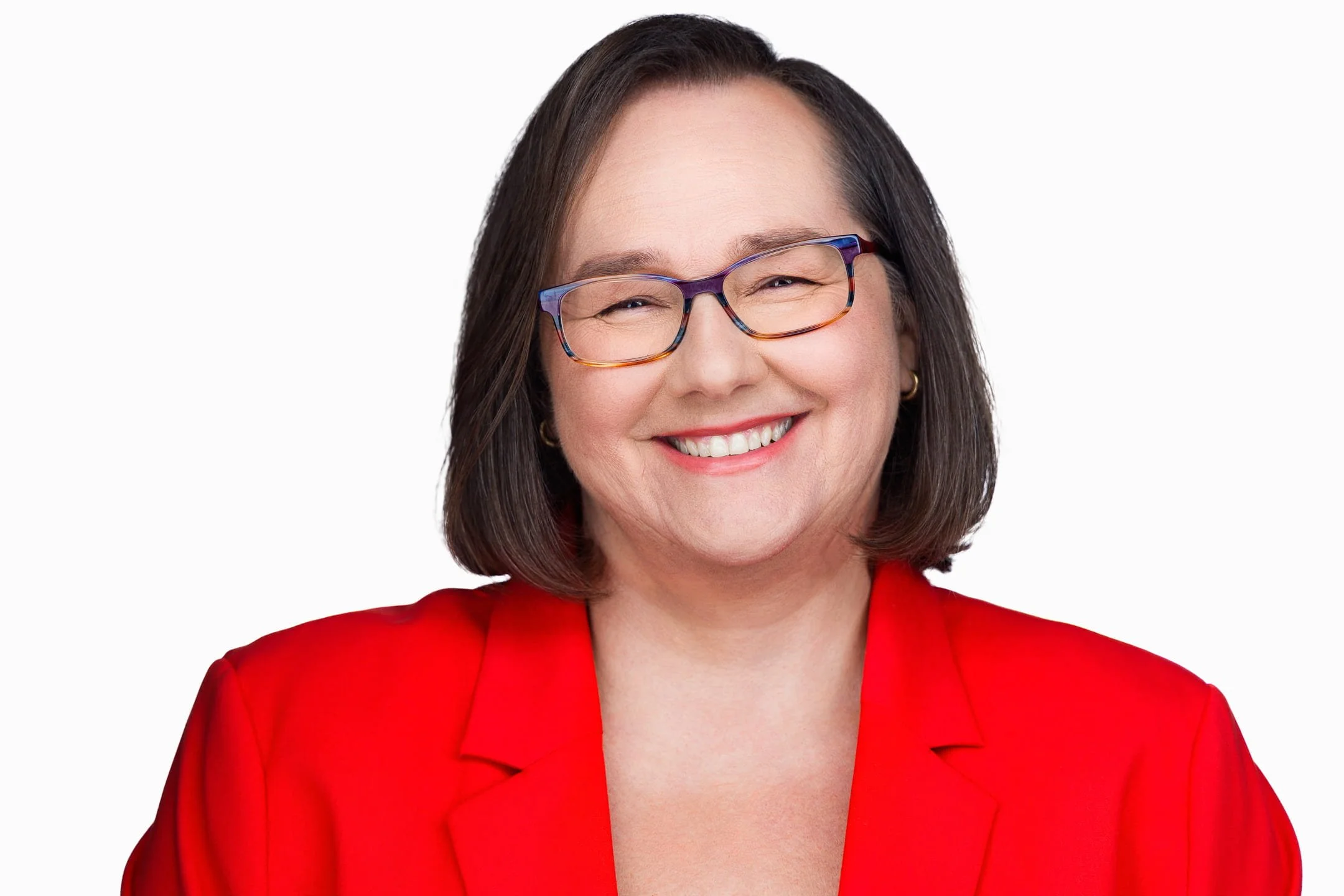 Example of What to wear for professional headshots for females with red outfits