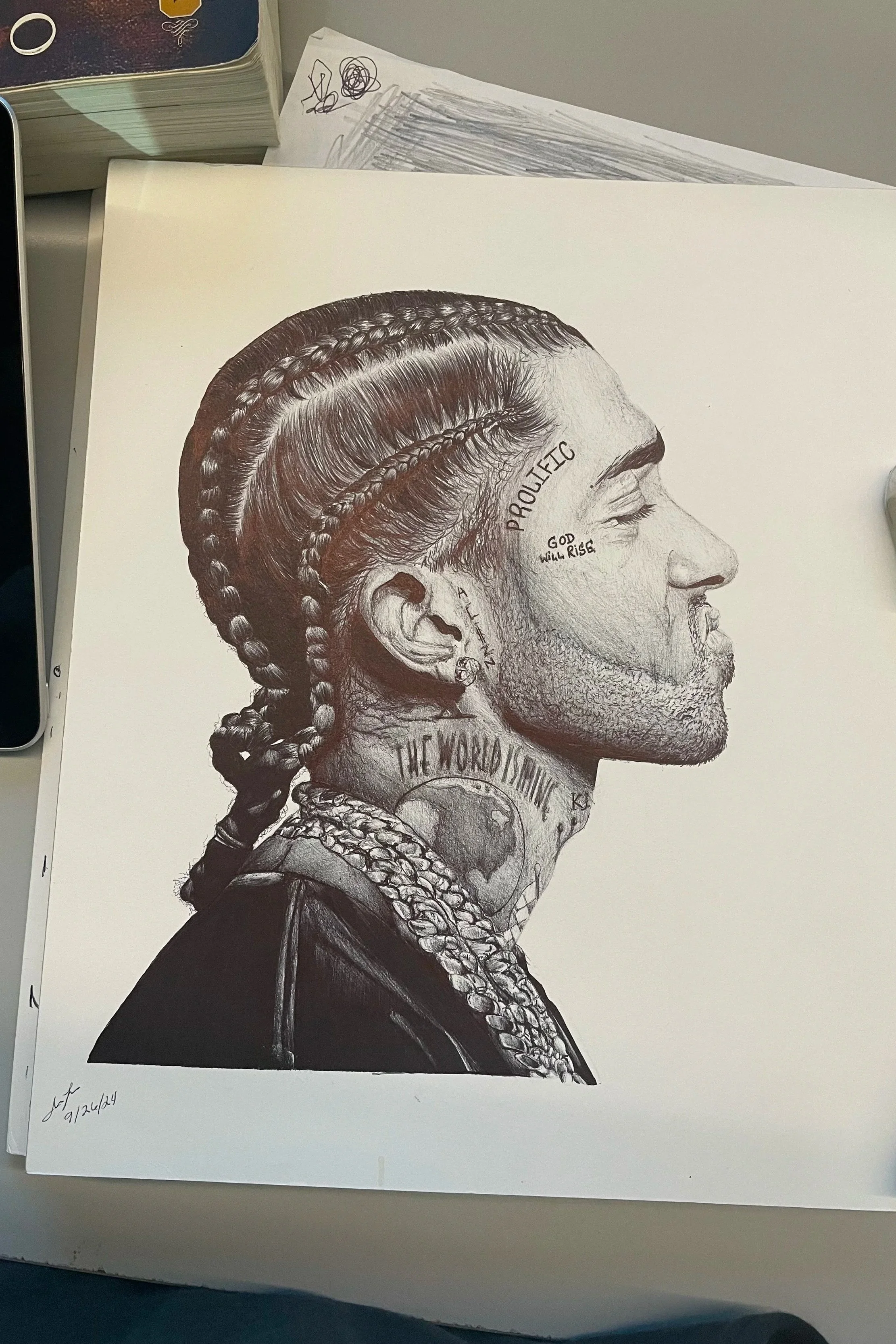 Black and white portrait drawing of a man with braided hair, multiple tattoos, jewelry, and the words 'PROUD ERC' and 'GOD WILL RISE' on his face and neck.