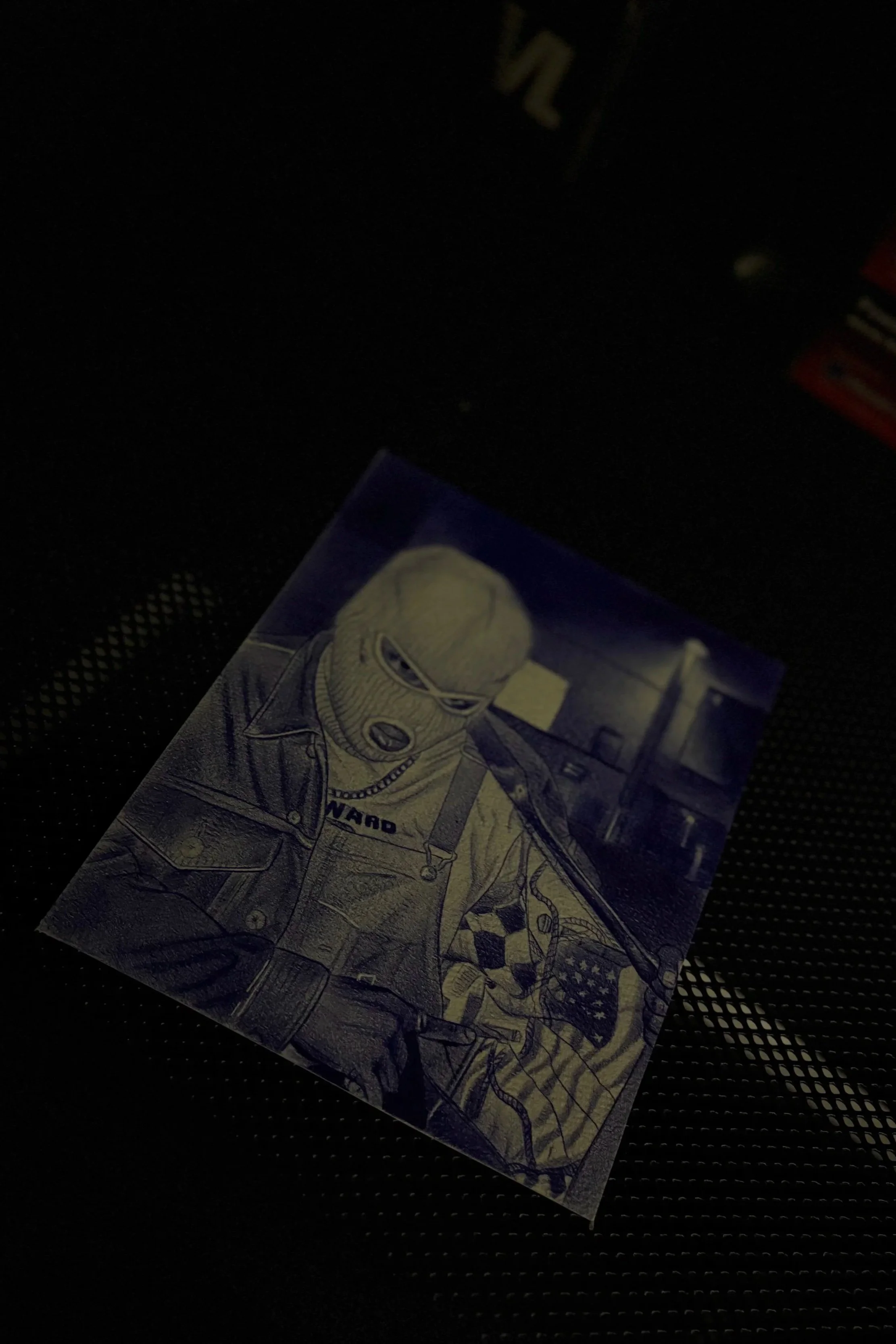 A poster depicting a person wearing a ski mask, denim jacket, and headphones in a stylized, hand-drawn art style.
