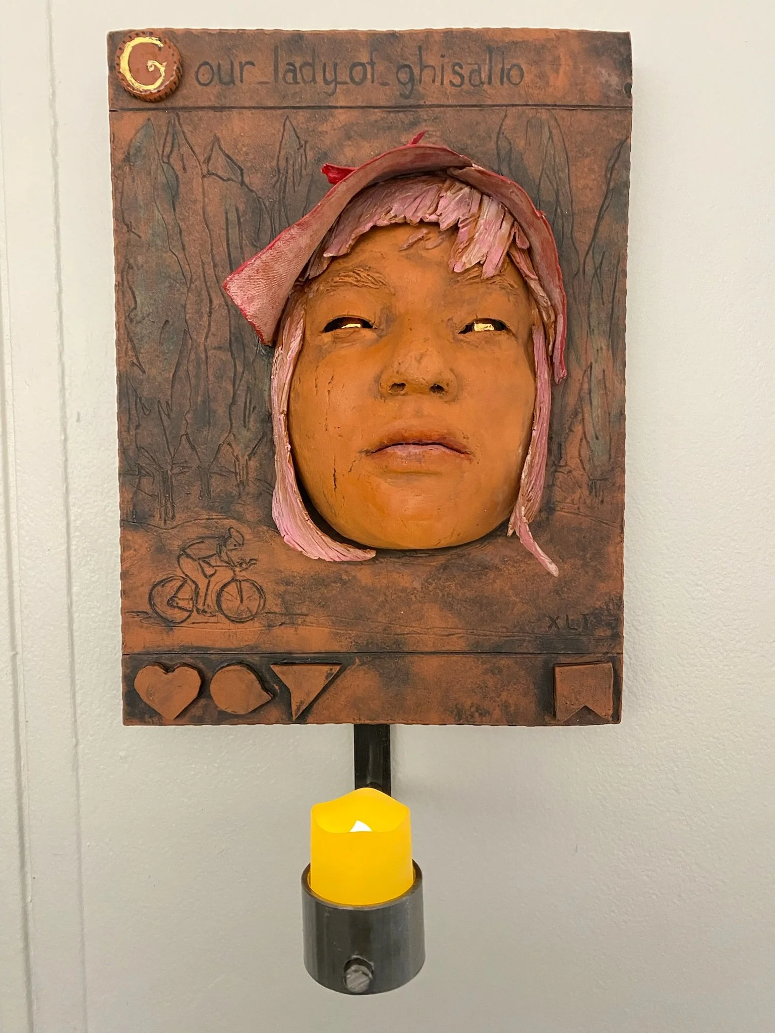 Our Lady of Ghisallo: Patron 
Saint of Cyclists (Judean 18 BCE-41)
A priest in Ghisallo established this shrine for bicyclists in Lombardy, Italy. Broken bicycles, bicycle parts and damaged frames now decorate it. I thought that Lombardy pines, a bic