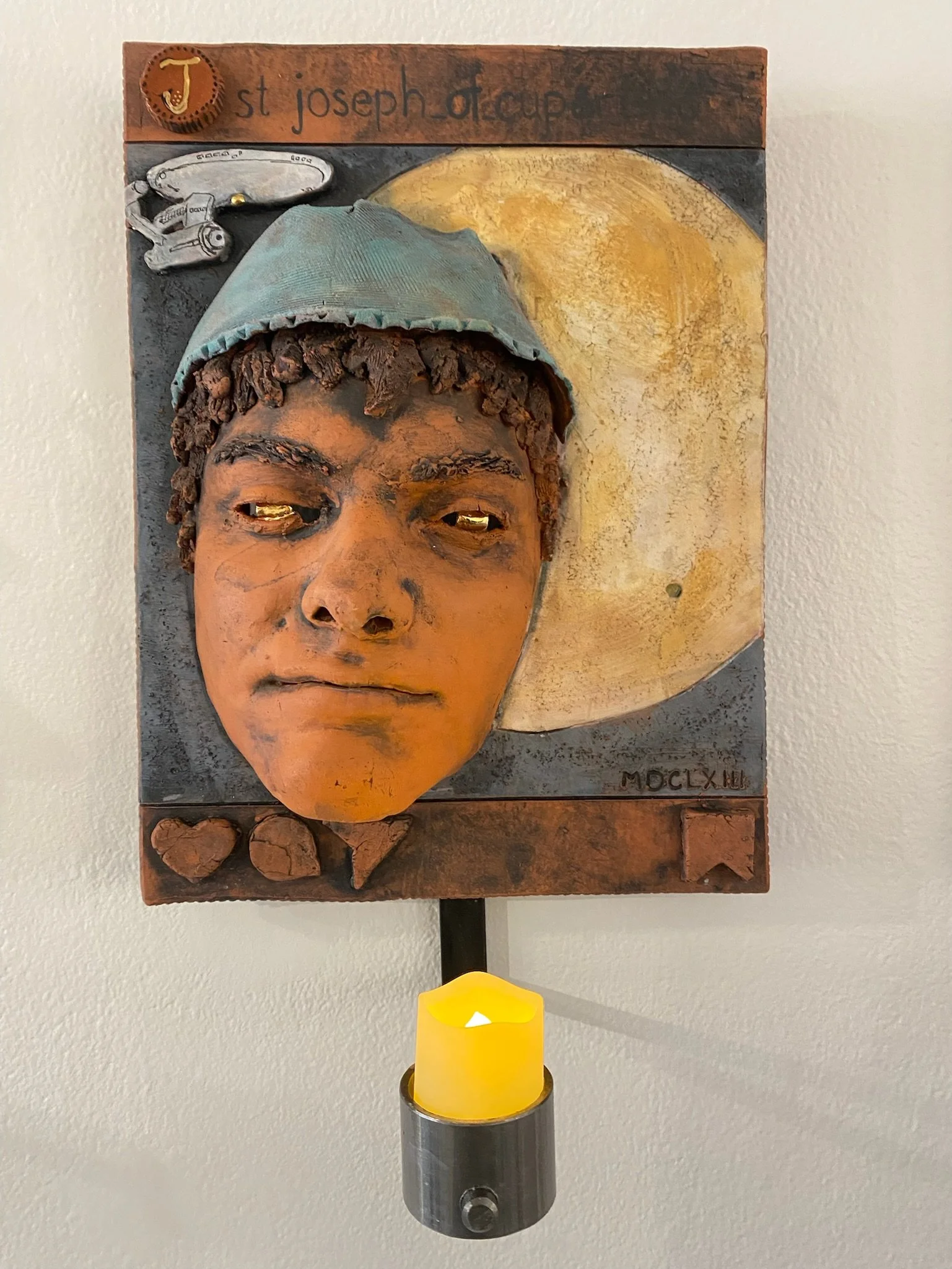 SOLD: St. Joseph of Cupertino:
Patron Saint of Astronauts (Italian 1603-1663)
It has struck me that astronauts must be cautious and brave, facing unknown conditions and continuing to explore. As a child, President Kennedy’s space program caught my im