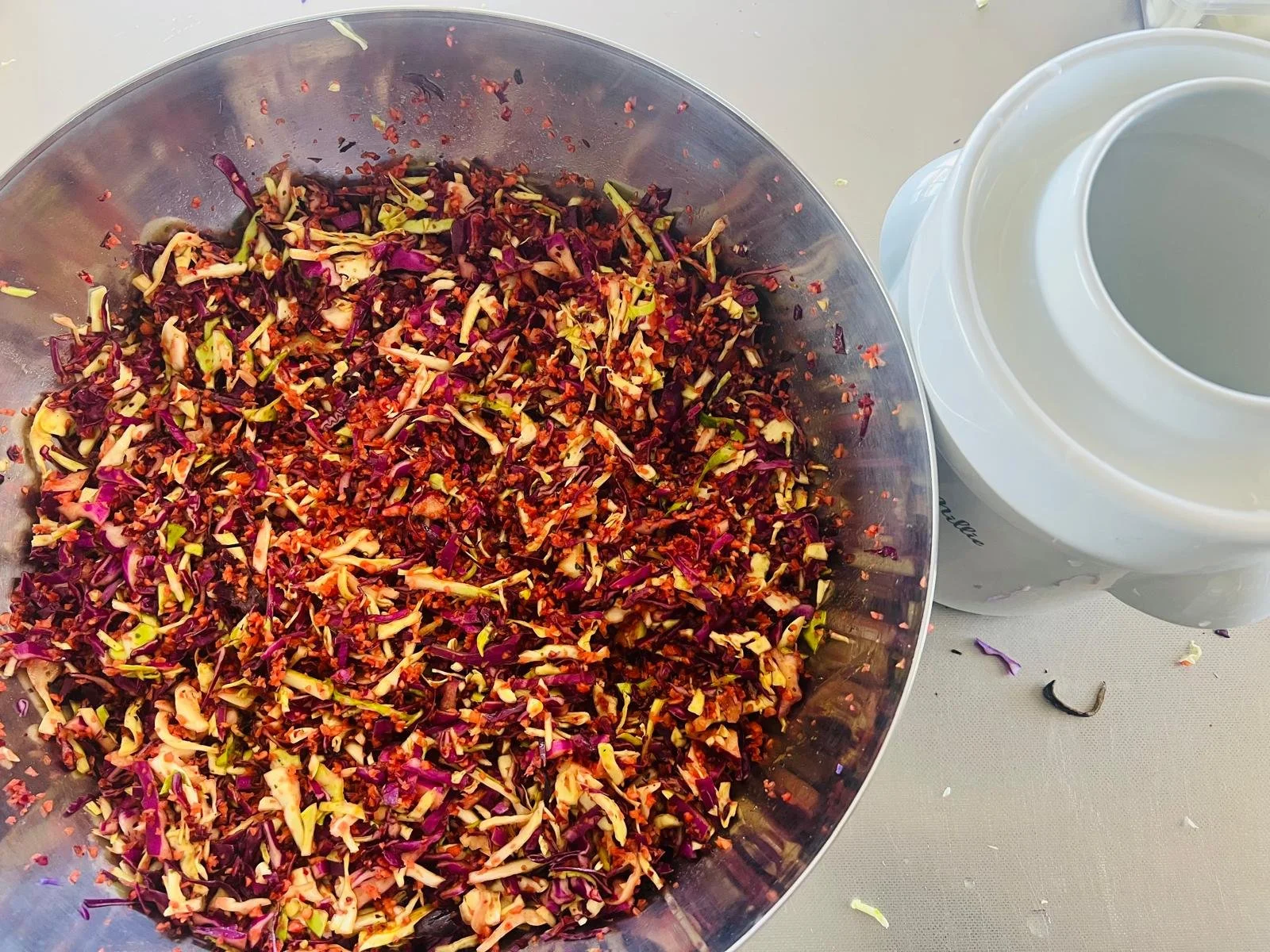 Our sauerkraut stocks were running low - so G has been busy making a colourful new batch!

White and red cabbage, carrot and beetroot, with turmeric, ginger, garlic and sea salt, all ready to be packed tightly into its sterilised jar and left to work