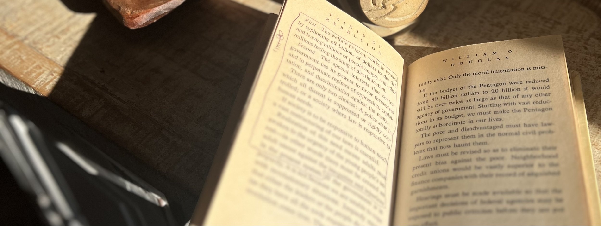 Image of William O. Douglas's Points of Rebellion, opened to a page on the choices between police state and laws responsive to human needs.