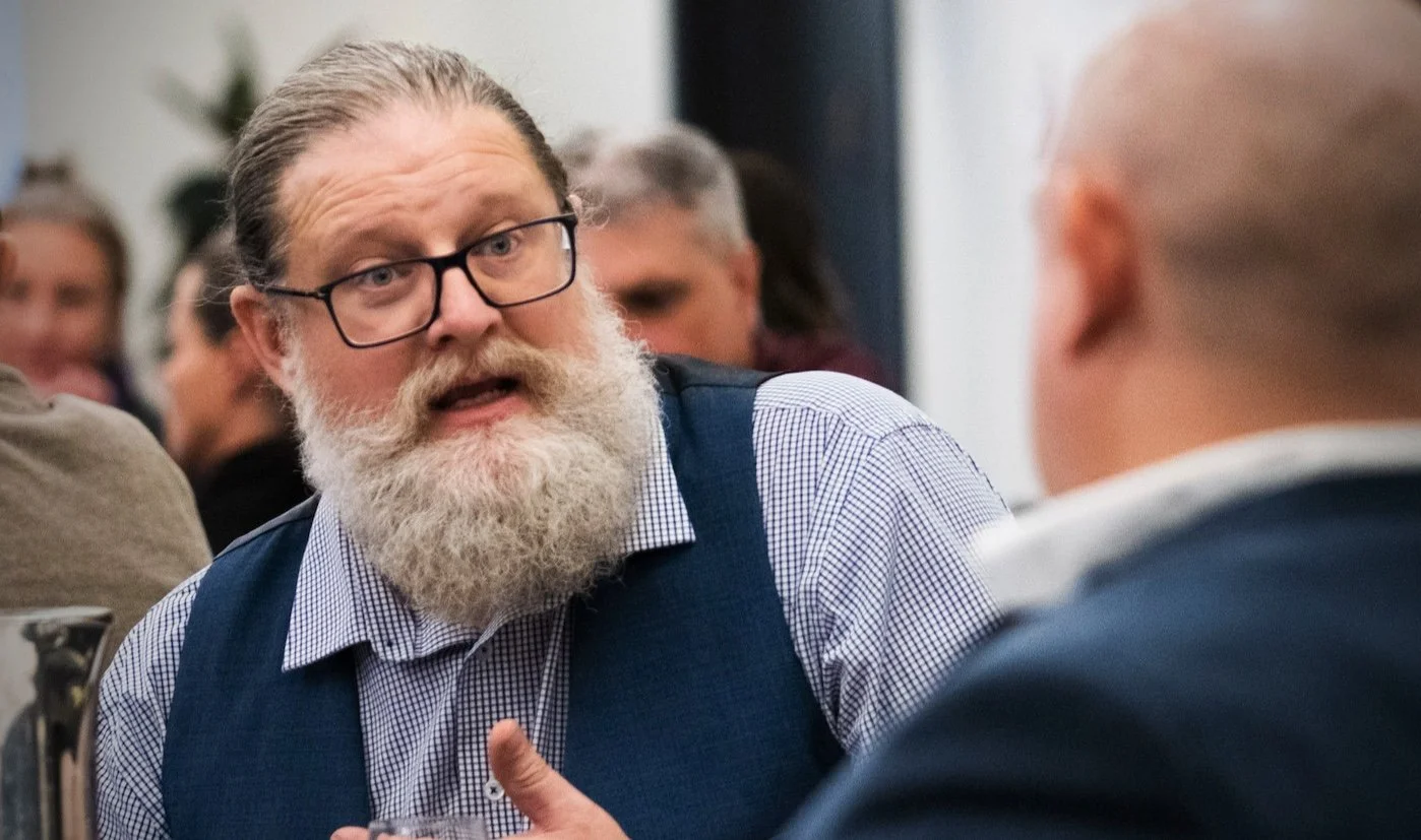 Two people in a heated, but productive conversation.