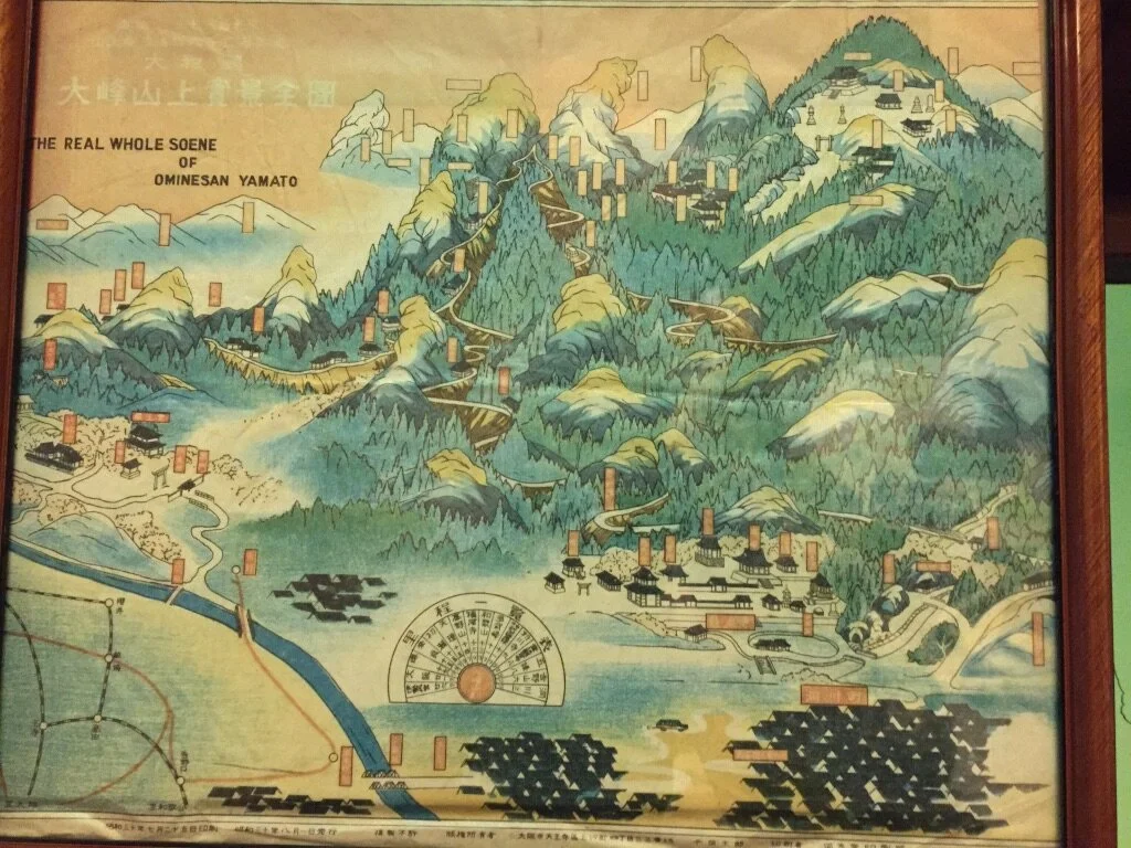Map of Mount O-mine-san Yamato showing trails, buildings, and scenic areas in traditional Japanese style.