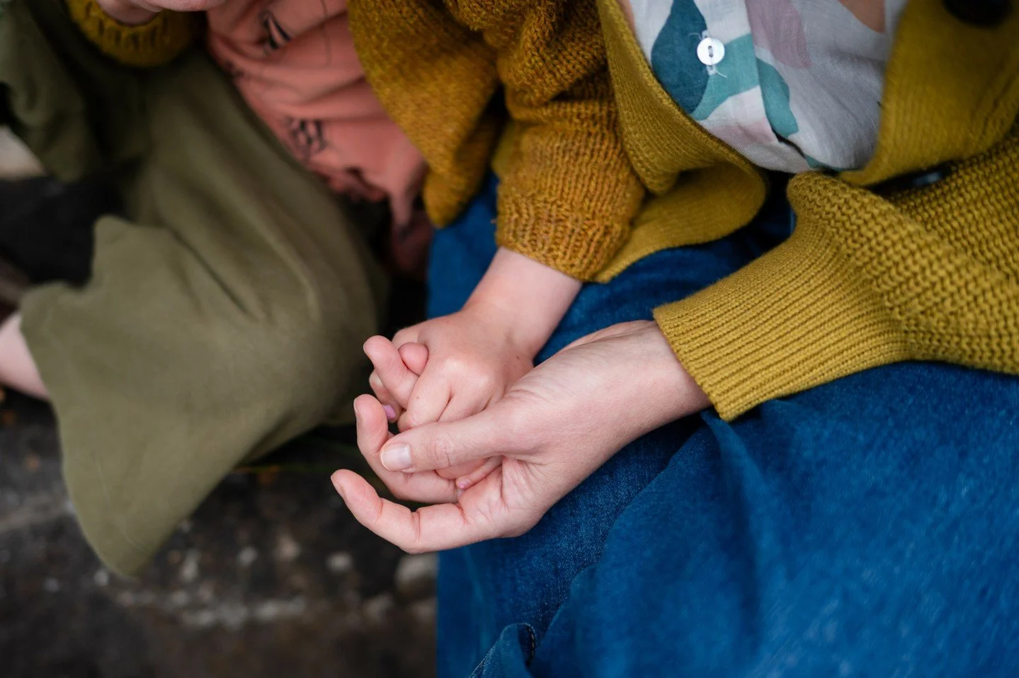 This is what I&rsquo;m always watching for:

Not the poses.
Not the smiles.

The small moments in between -  the way your child leans into you, or how your partner instinctively reaches for a hand.

Those are the moments that quietly become the most 