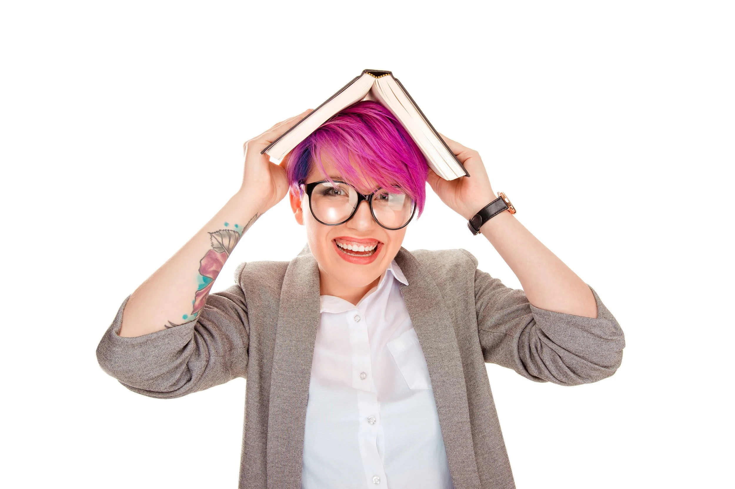 Woman pink hair with book on head