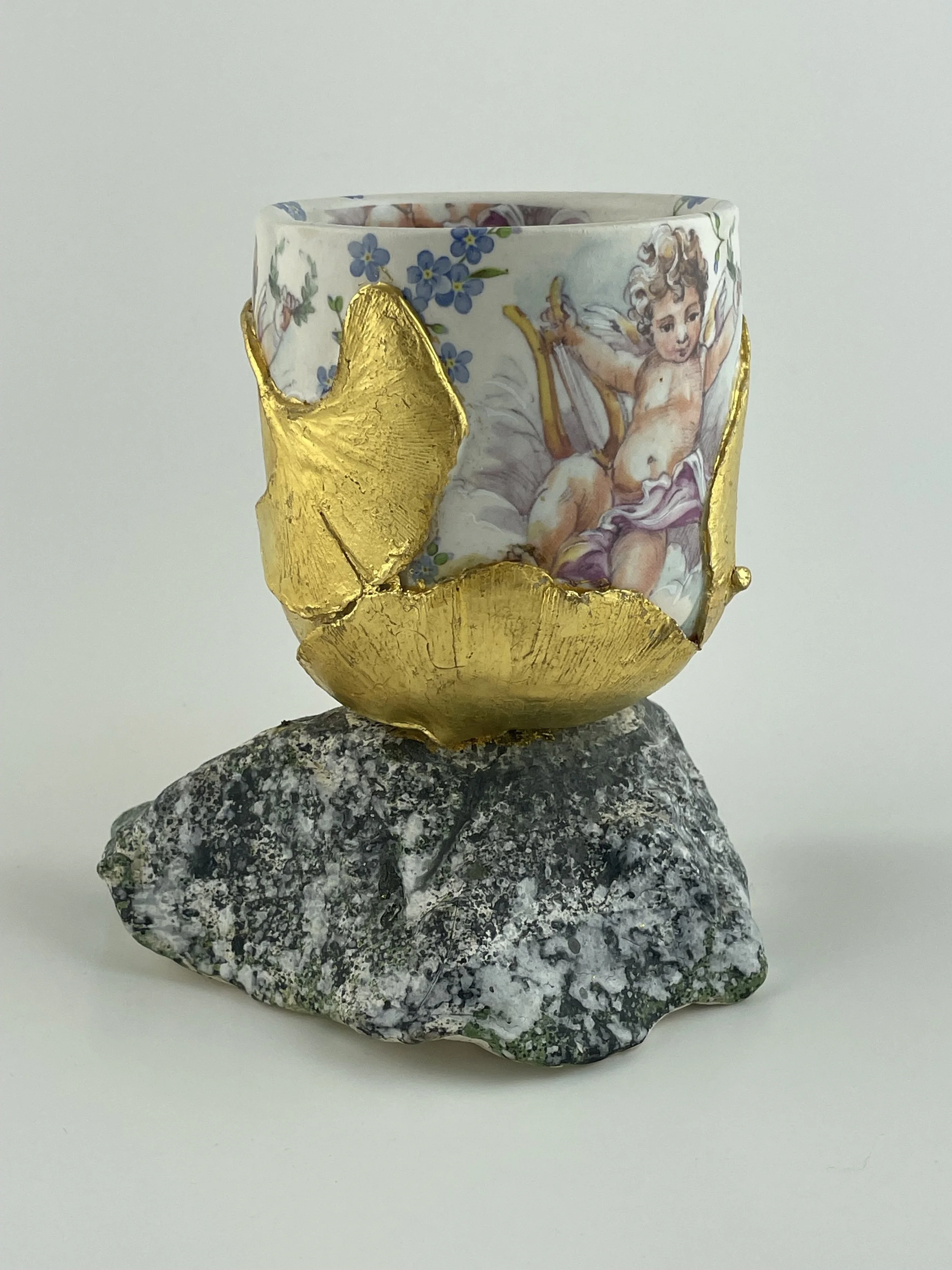 Pot on a Rock - Celebration of Putti in Blue Garden