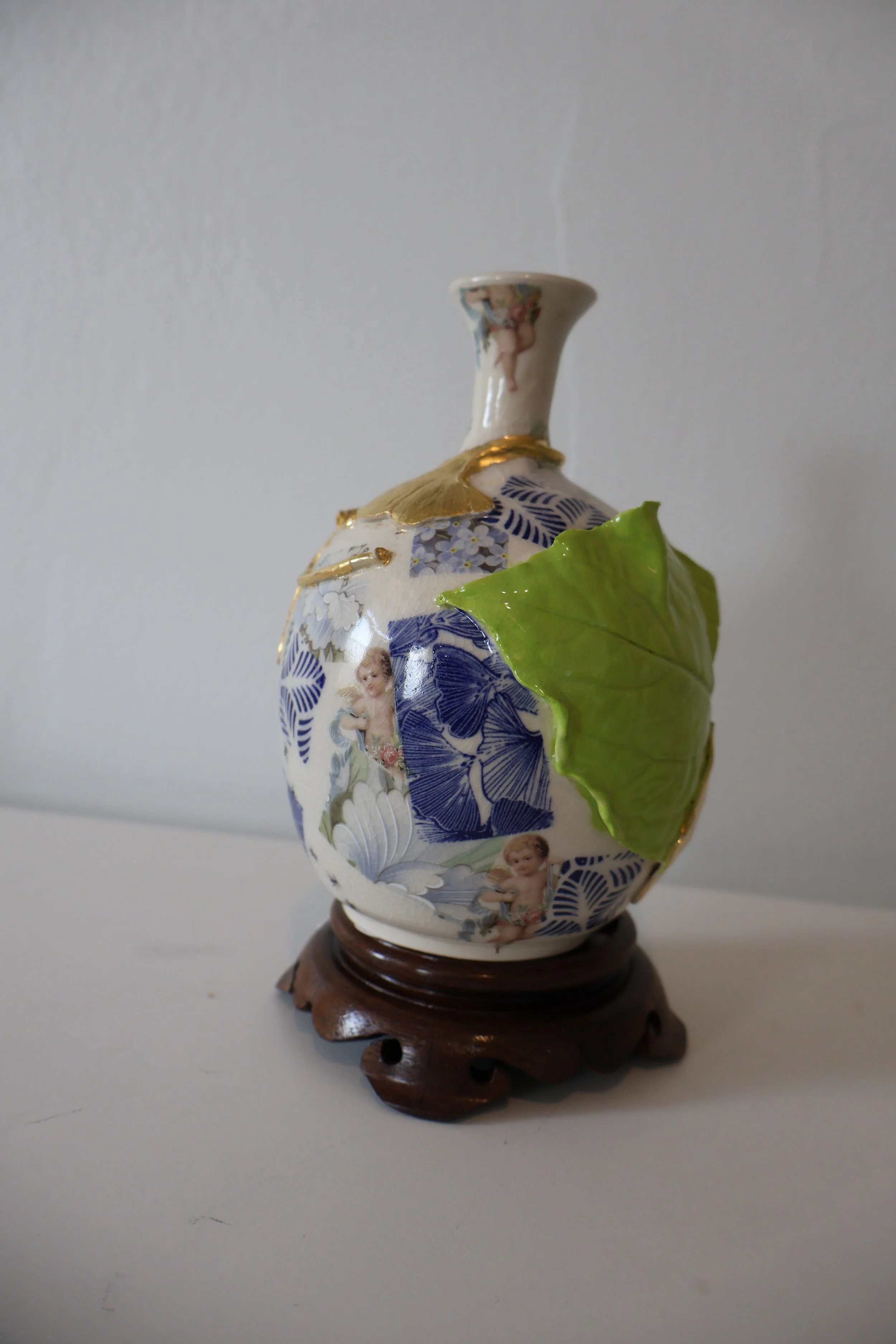 Japonisme Bottle with Putti and Pests