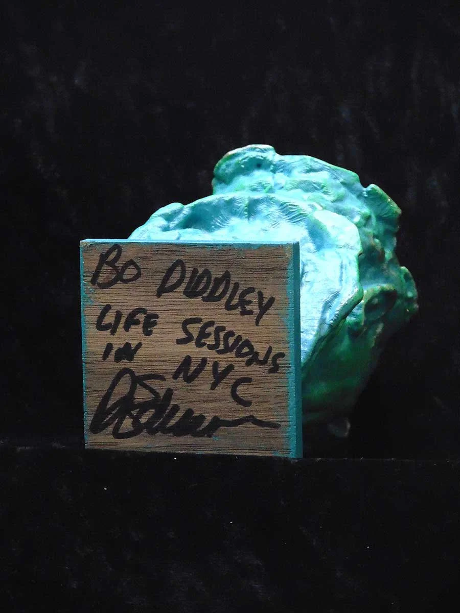1200px-Bottom-Bo-Diddley-WEB.jpg