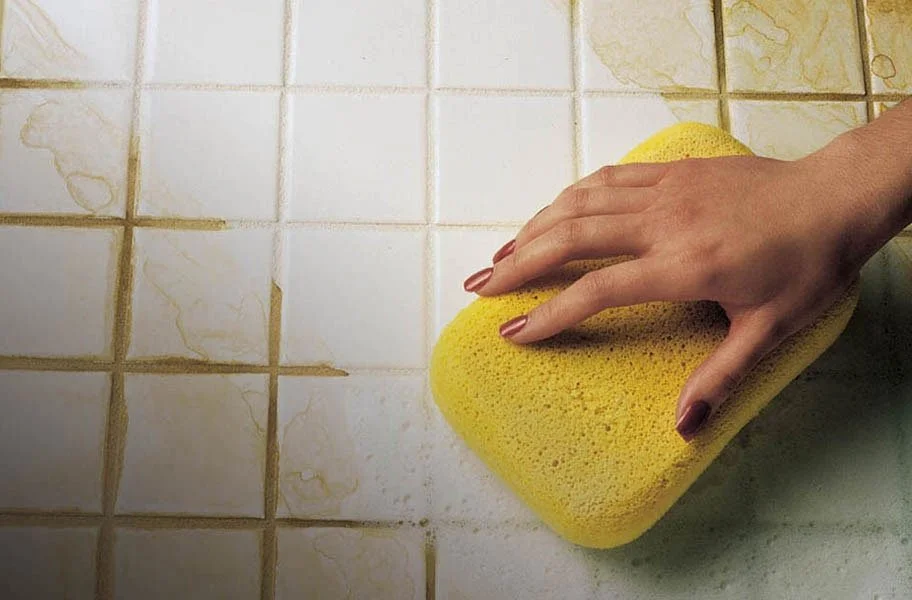 cleaning-grout-with-a-sponge.jpeg