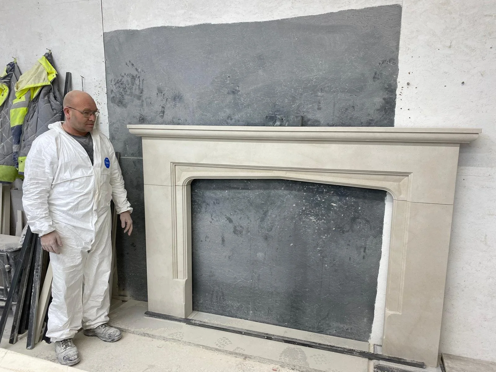 GO LARGE.........

We make fireplaces in all shapes and sizes, and really like making big fireplaces. Here's Ian, one of our master masons, standing next to his latest creation, a huge arts &amp; crafts style Windsor fireplace in our favourite limest