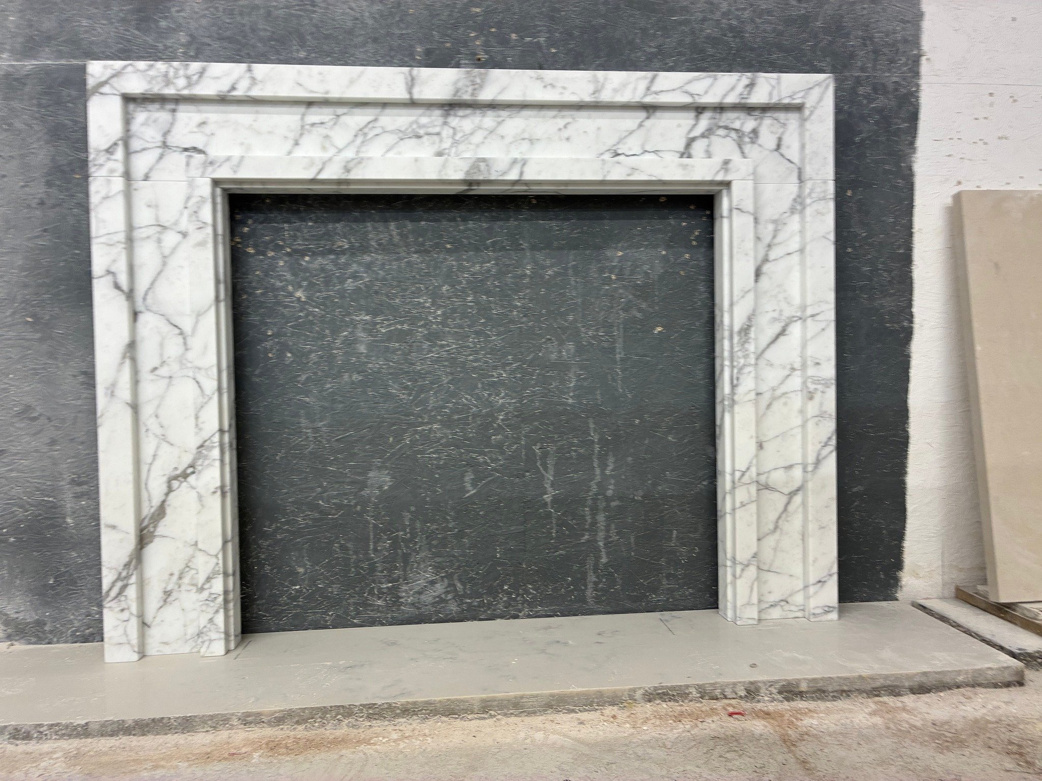 Fresh off the bench.......

All set up in the workshop for a final check, one of our Goring fireplaces in a rather fetching Arebascato Corchia Italian marble. As always hand-crafted with love by our wonderful masons.

#marblefireplace 🔥🏠🔥#bespokfi