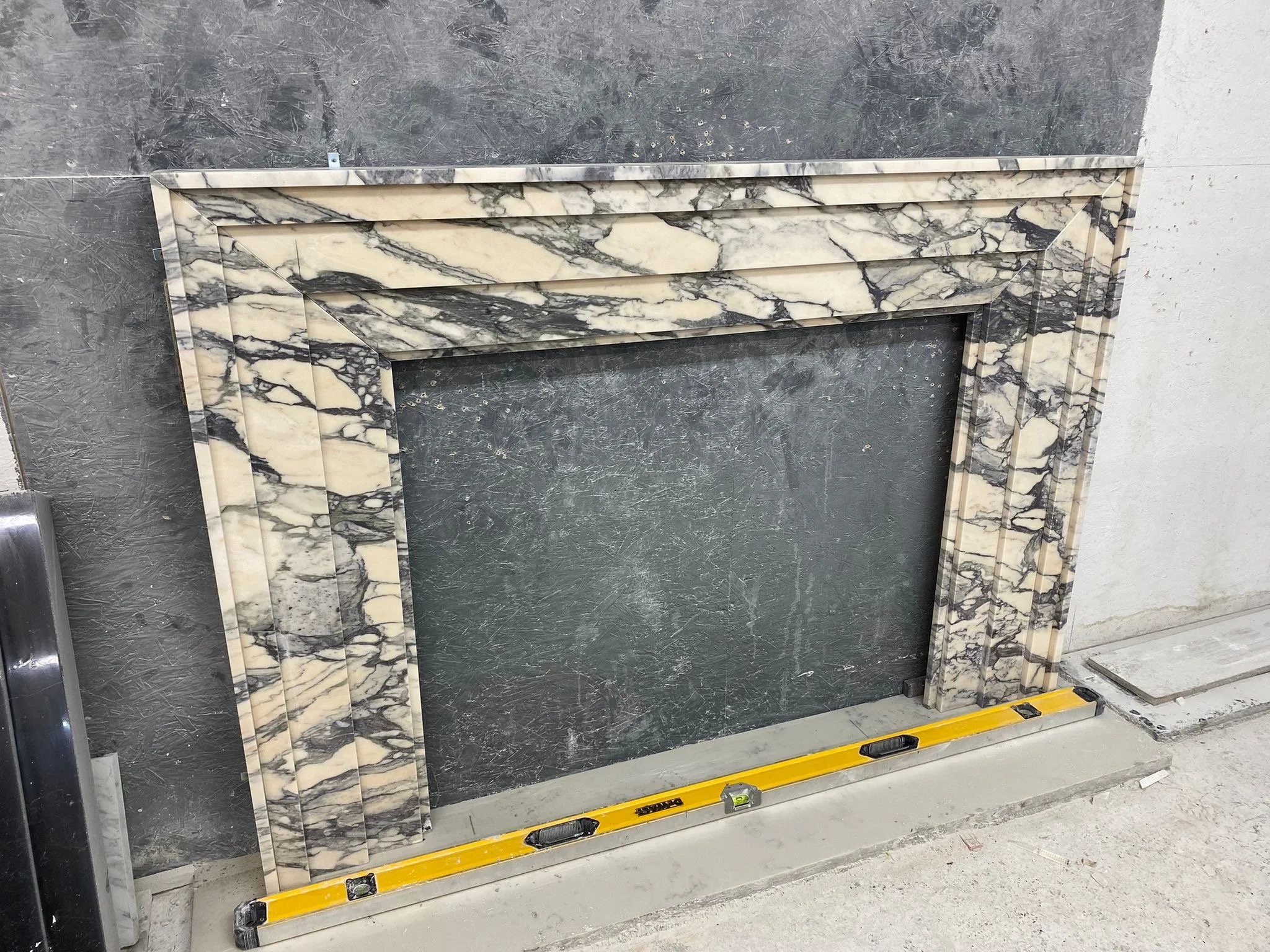 Lovely bit of stone part2.........

This is what we made and we are so pleased with it. A bespoke one-off customer commission in a beautiful Calacatta Viola Italian marble, it's going to look stunning in its new home. As always handcrafted with love 
