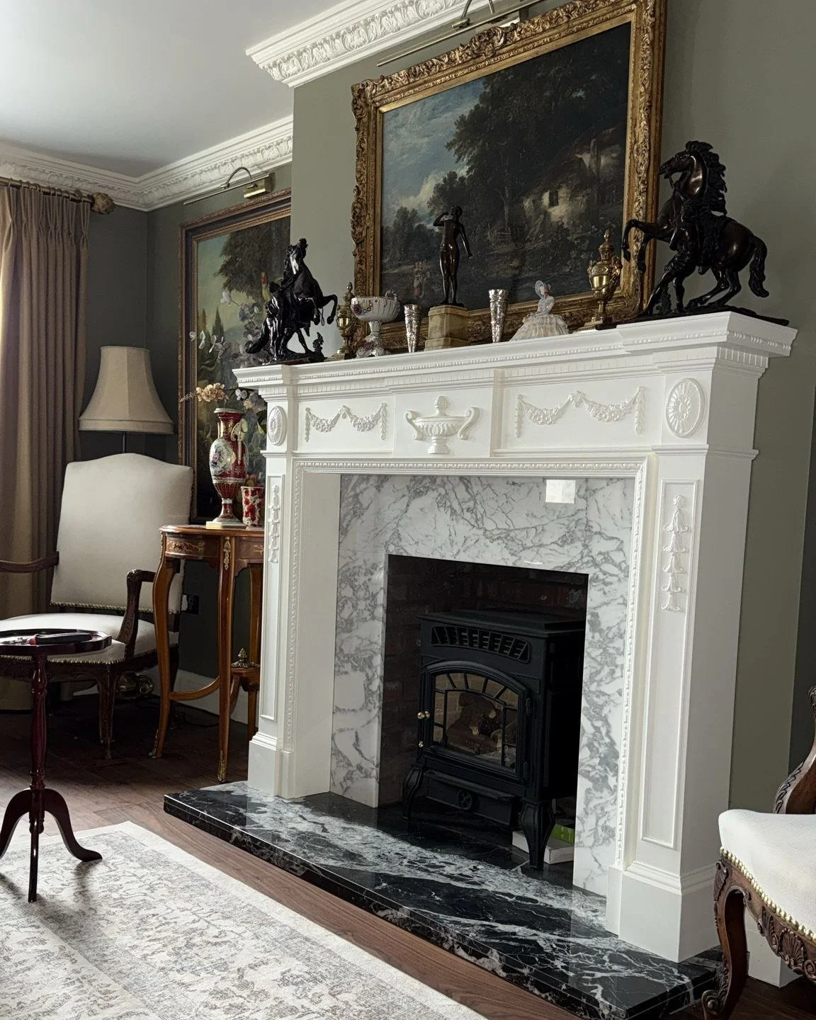 Install update.........

We recently posted a few images of one of our handmade Keats fireplaces being installed. The room is now finished and decorated, and our customer who is a keen  collector of antiques and paintings has sent us this rather nice