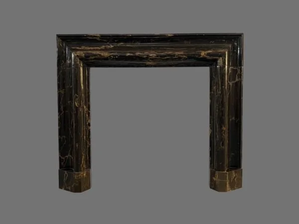 Classic large bolection fireplace in Portoro marble