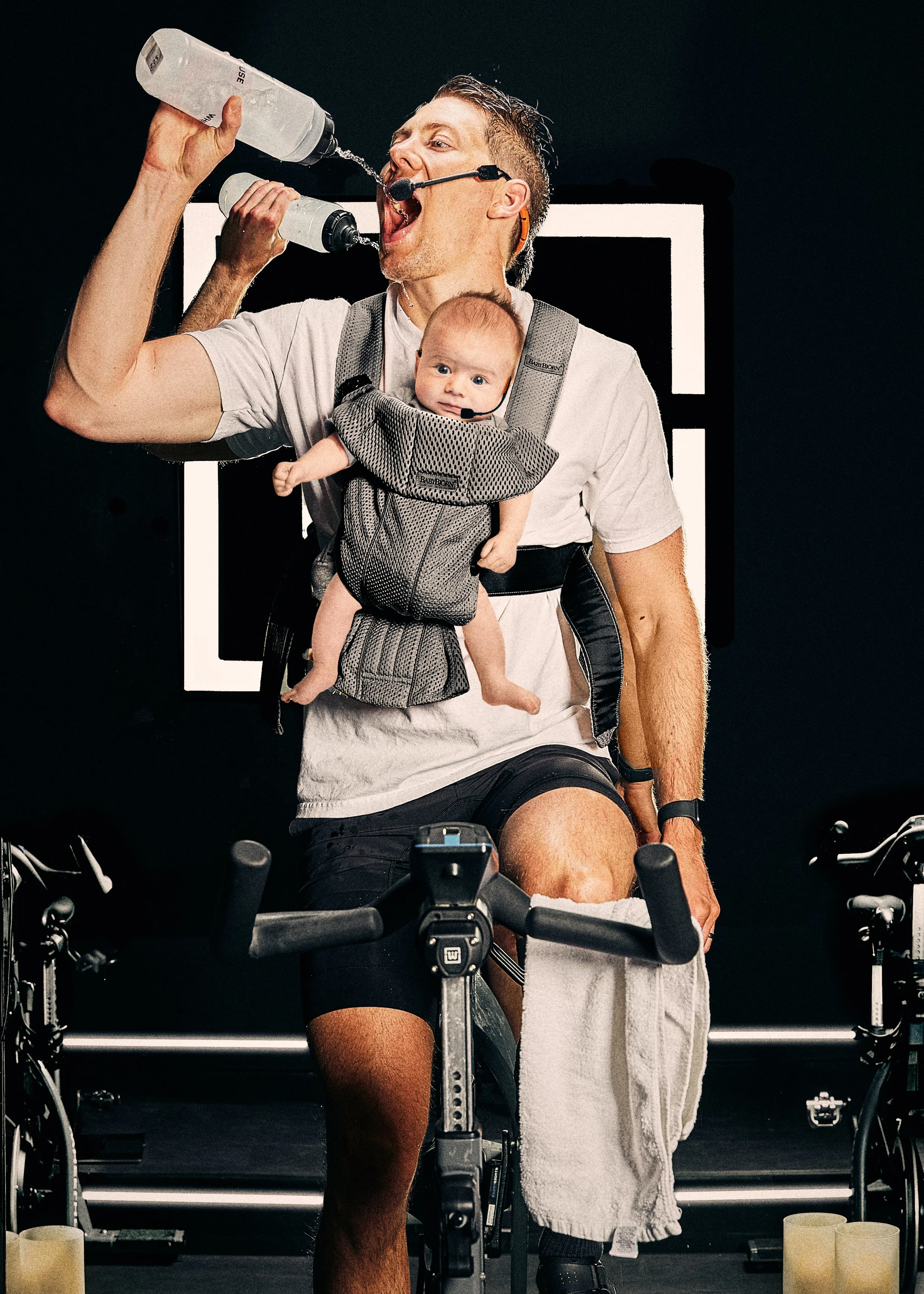 Wheelhouse Cycle Club's owner, Kyle Gibson, mastering the multitask.