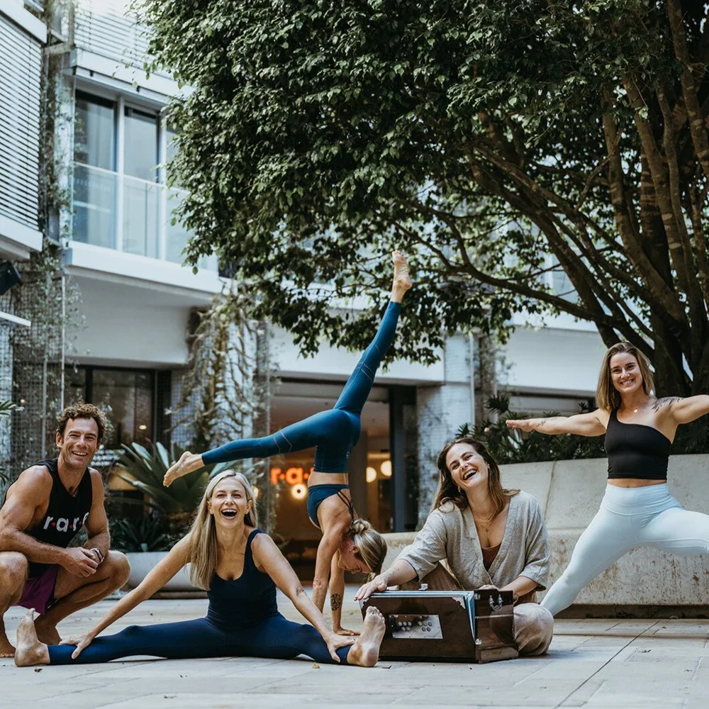 The Rare Yoga team posing outside