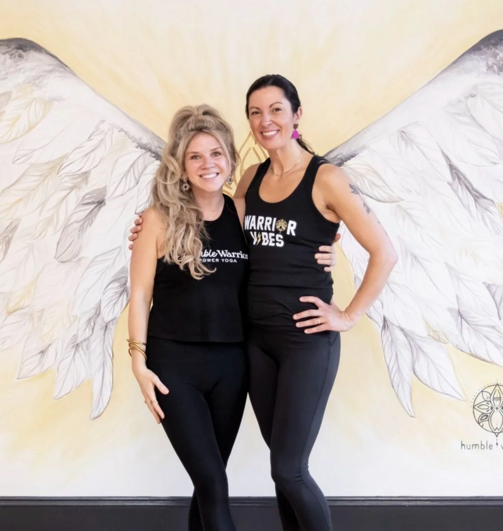 Founders of Humble Warrior pose arm in arm and smile into the camera