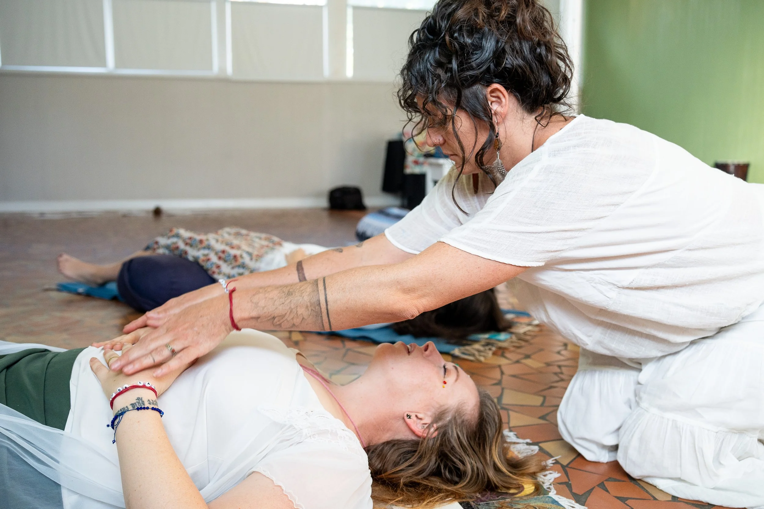 Breathing and healing exercises during a yoga class
