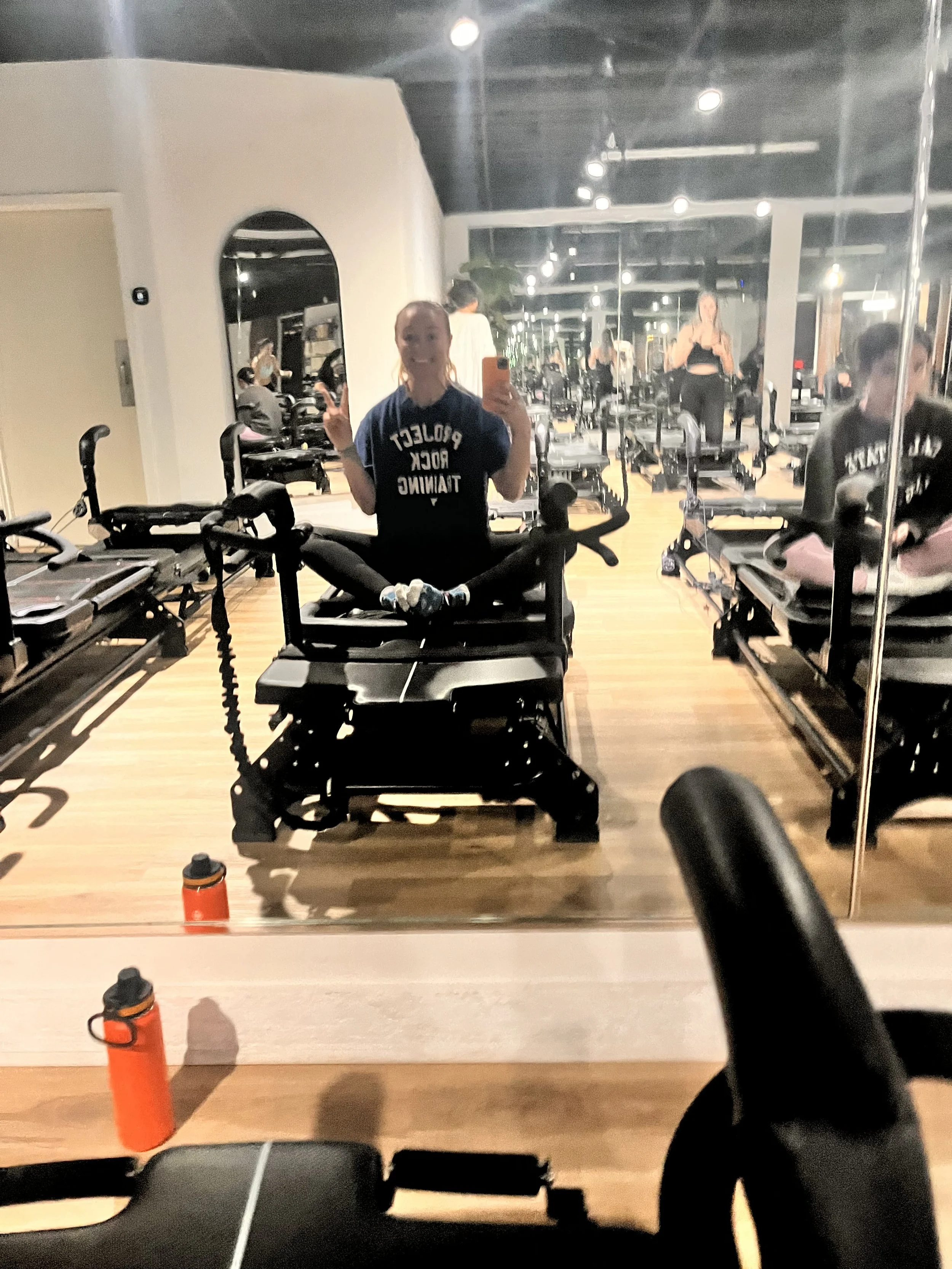 Woman on a megaformer during a Lagree class at Define Lagree in Point Loma, San Diego, CA