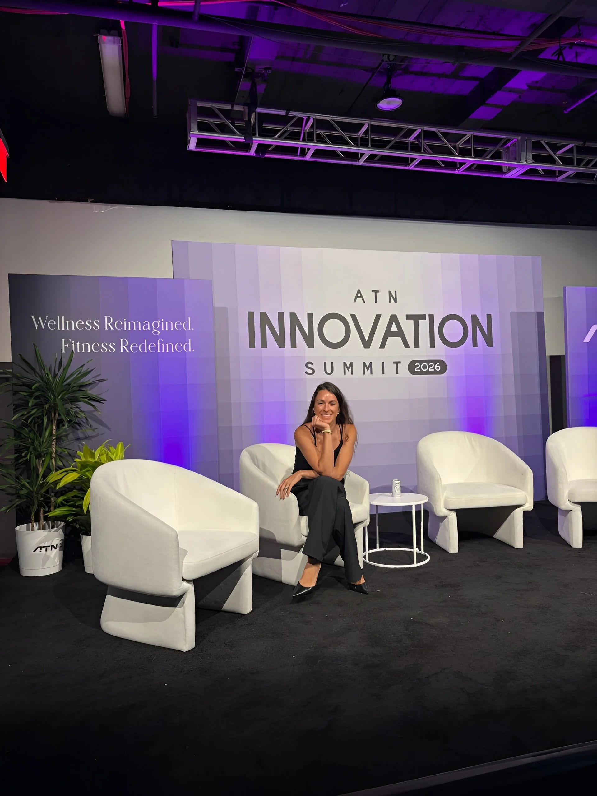 Catalina Zbar, Telomere's CEO, sitting at a ATN Innovation Summit 2026 presentation