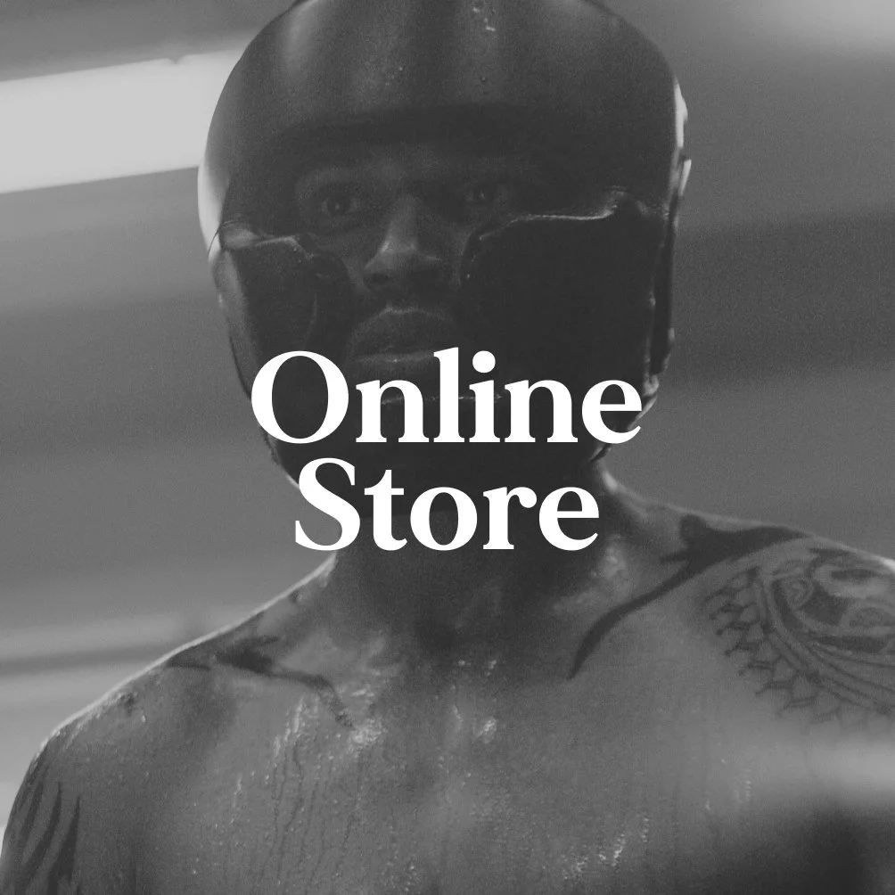 A black and white photo of a man with tattoos wearing sunglasses and a baseball cap, with the text 'Online Store' overlayed in the center.