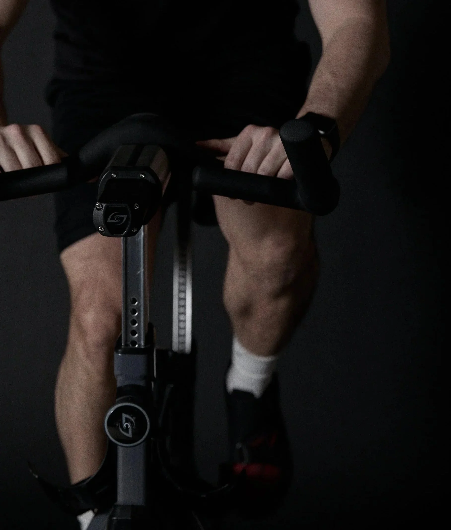 man riding a spin cycling bike