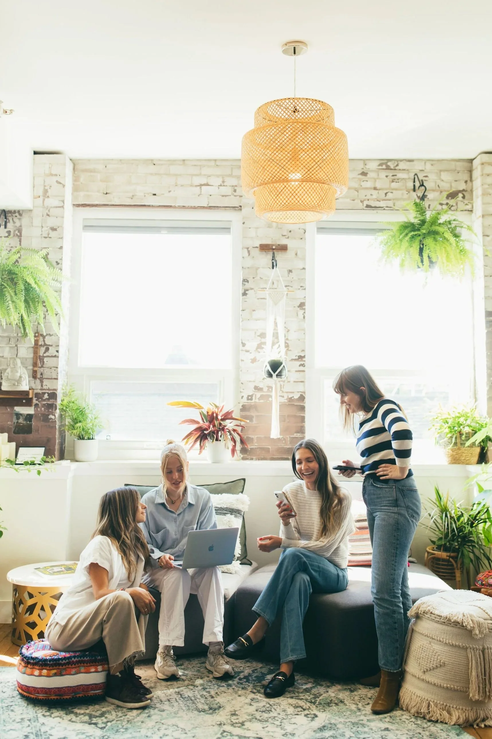 A group of women during a team meeting about boutique fitness marketing strategies
