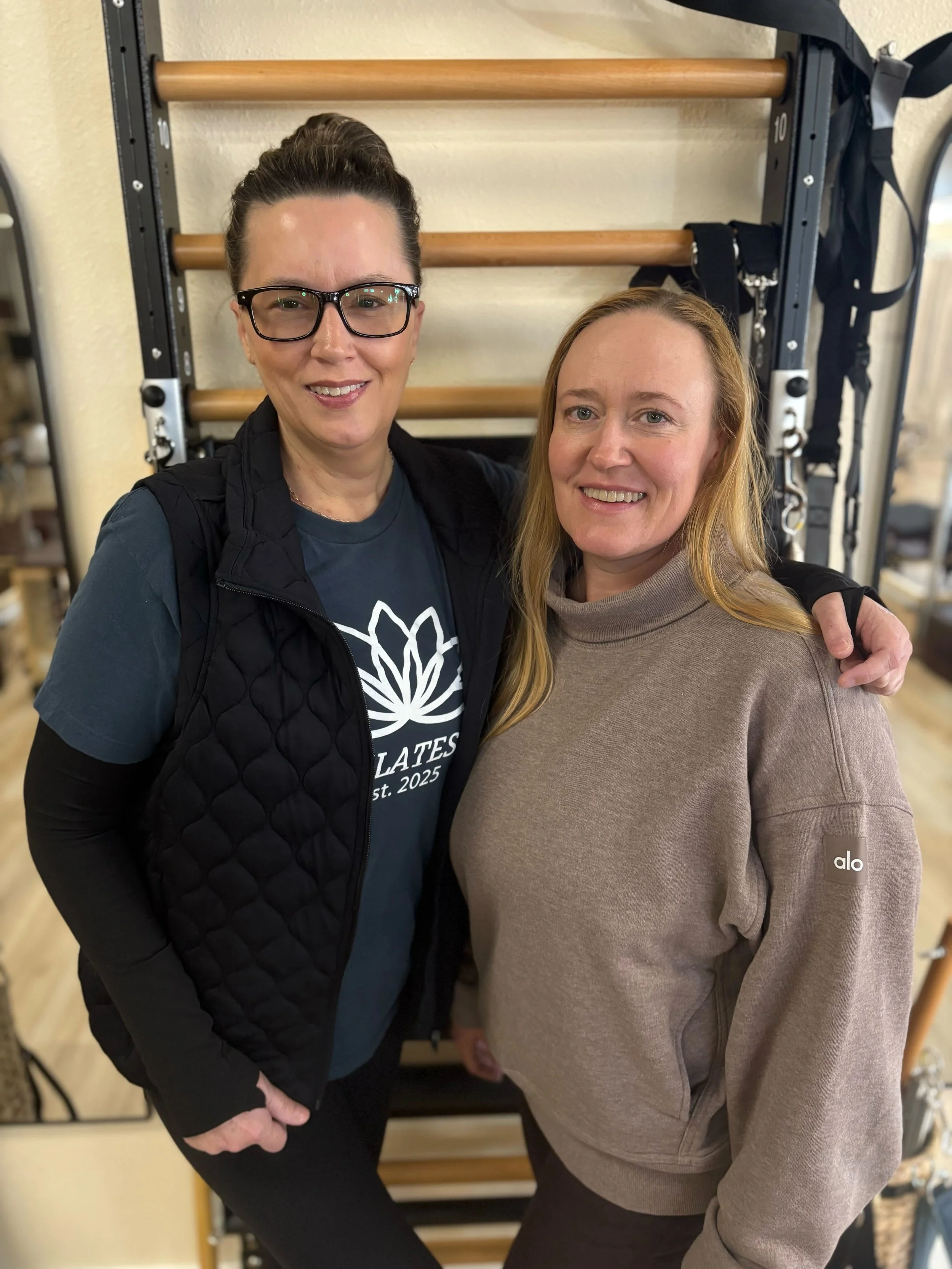 Rana and Amanda, founders of Your Pilates Place, in their reformer Pilates studio in Texas.
