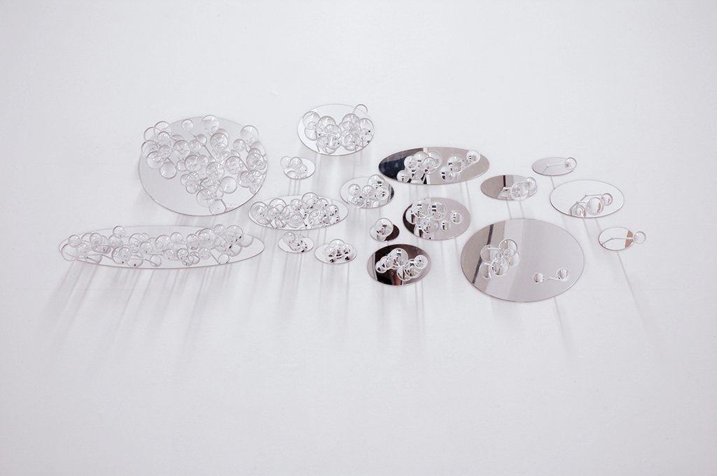 Interrupted: Sprawl,
Copper, Paint, Mirrored Acrylic, Meniscus Lenses,
 30’’x96’’x8’’,
2013