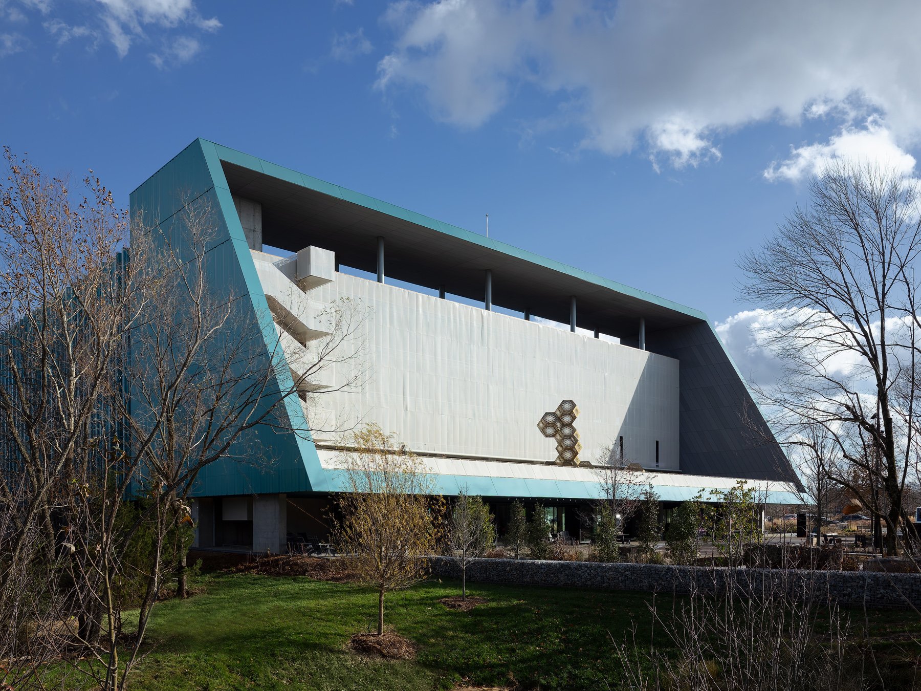 Crystal Bridges Parking wedge massing and white perforated screen wall, by Marlon Blackwell - architectural photographer Bentonville Arkansas