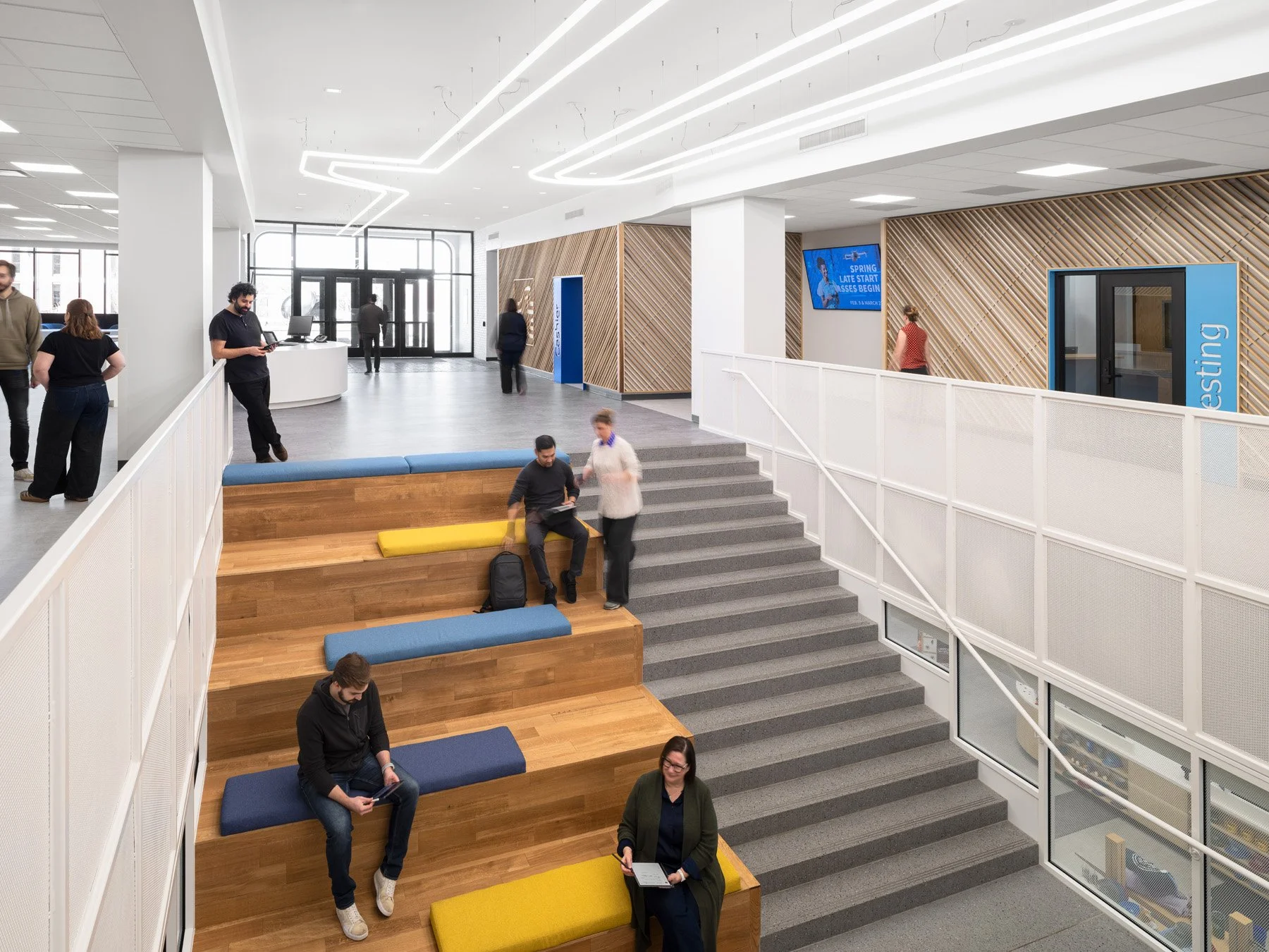 STLCC Florissant Valley Student Center assembly stair with wood seating tiers by JEMA, Ferguson Missouri - architectural photographer St. Louis