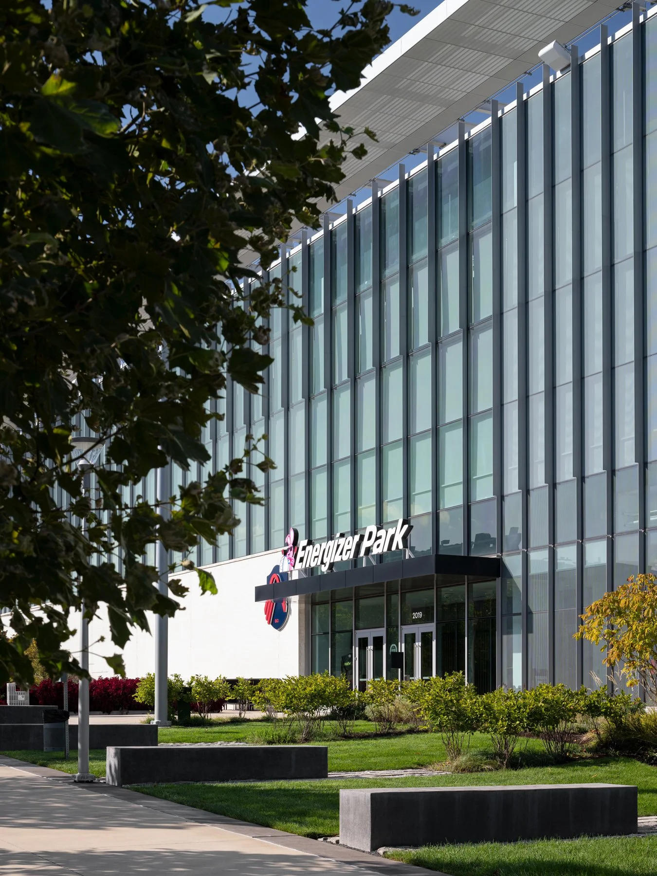 Energizer Park main entrance by day with vertical glass fins and the stadium name above the doors, by HOK and Snow Kreilich, St. Louis Missouri - architectural photographer St. Louis Missouri