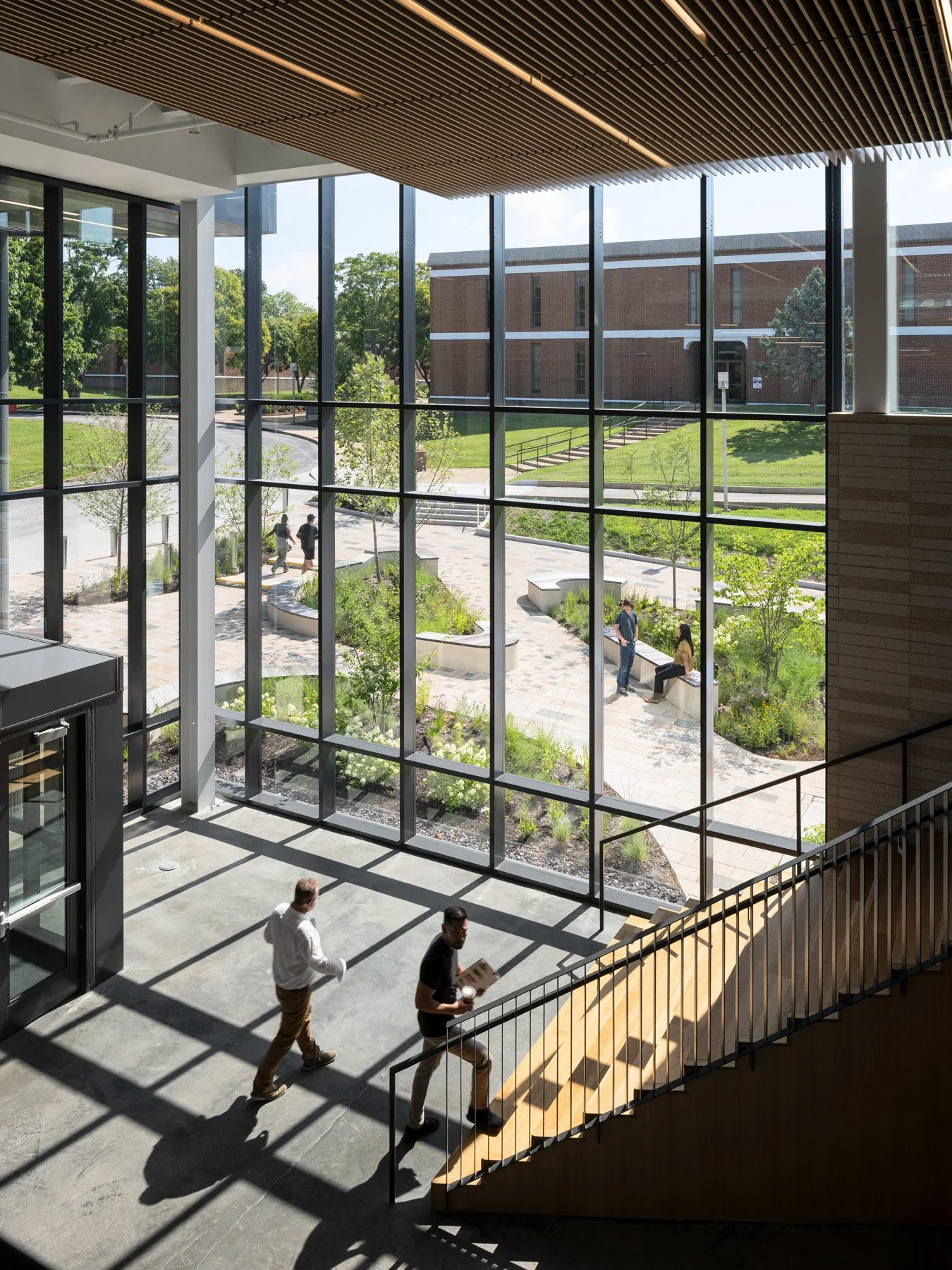 STLCC Florissant Valley Advanced Manufacturing Center interior lobby stair and glass wall by JEMA - architectural photographer St. Louis Missouri