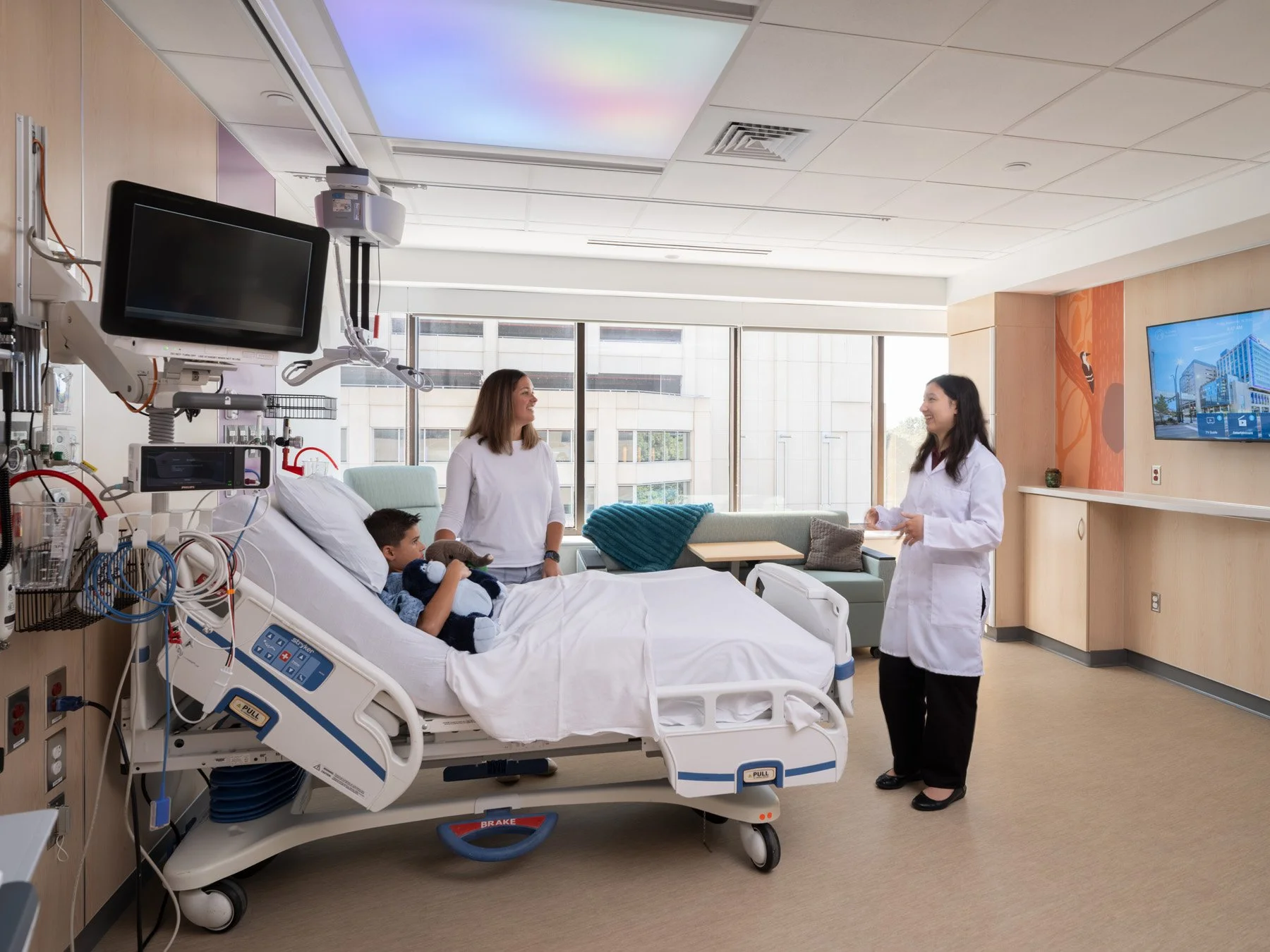 St. Louis Children’s Hospital patient room with a color-lit ceiling panel, by CannonDesign - architectural photographer St. Louis Missouri
