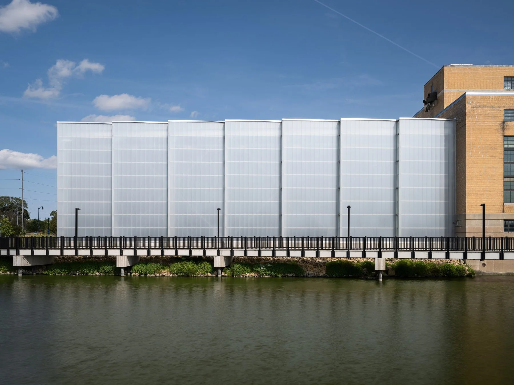 Beloit College Powerhouse field house translucent bays above the riverfront walkway, by Studio Gang - architectural photographer Beloit Wisconsin