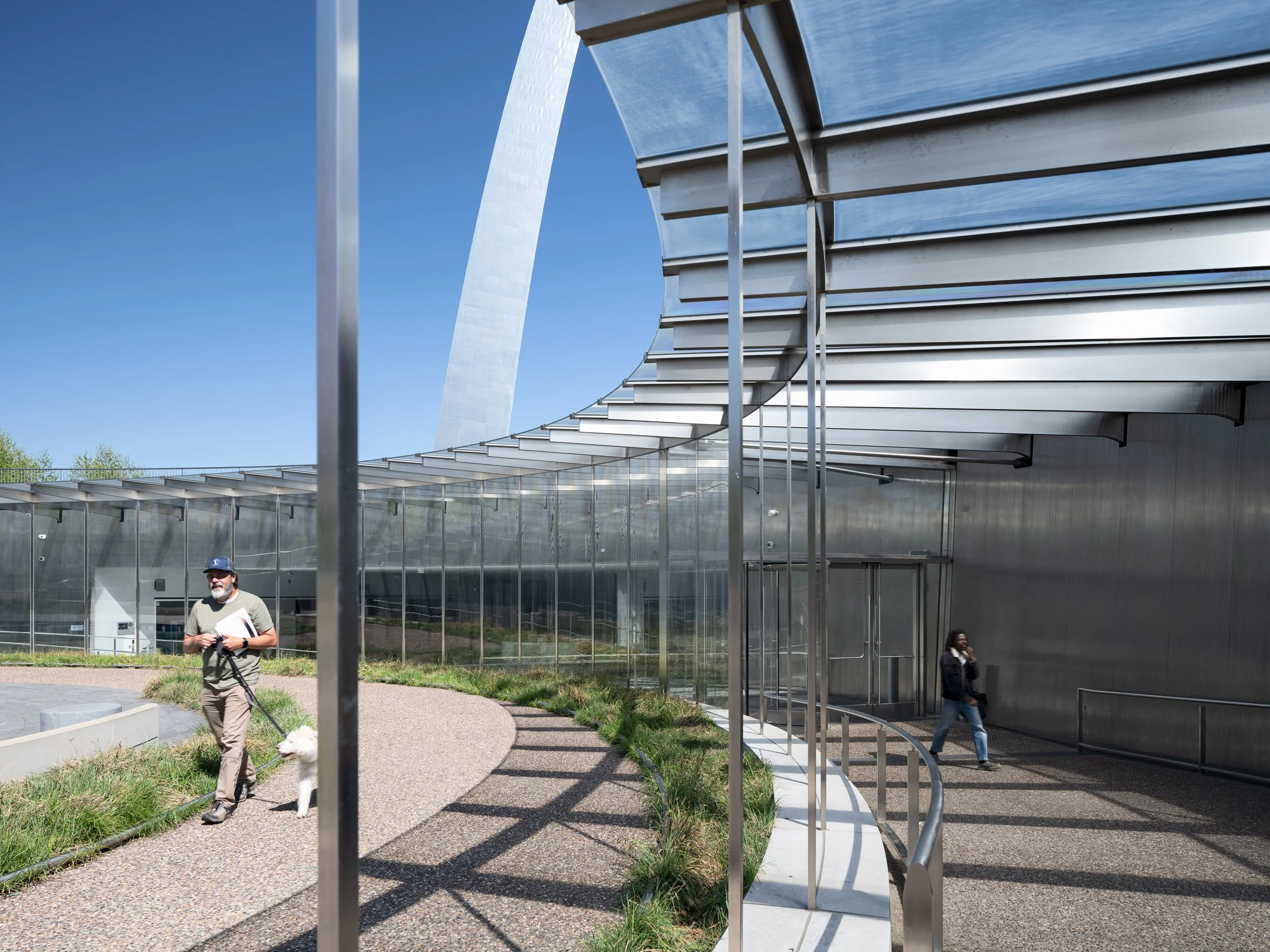 Gateway Arch Museum circular glass and steel entry pavilion with stainless-steel screen walls by Cooper Robertson and Trivers, St. Louis Missouri - architectural photographer St. Louis
