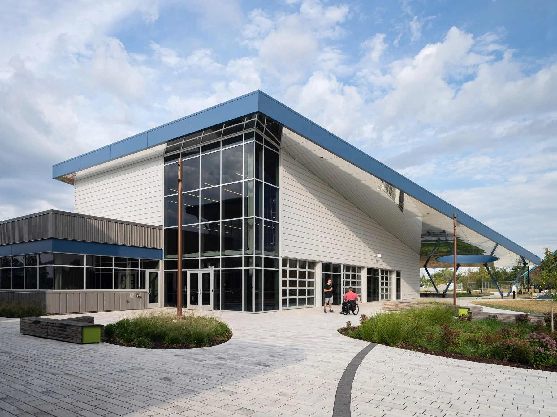 Kinetic Park two-story glazed corner under the deep cantilevered roof, by JEMA - architectural photographer St. Louis Missouri