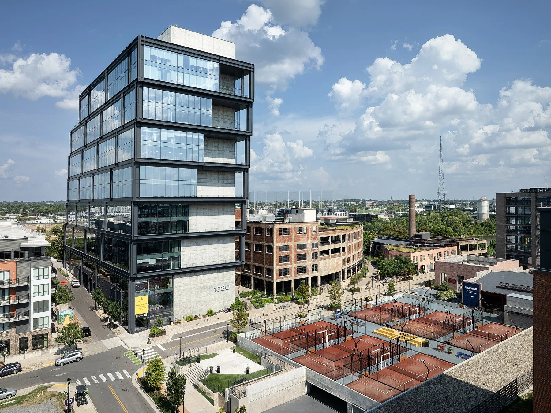 Neuhoff District office tower with stepped glass cantilevers over Adams Street by S9 Architecture - architectural photographer Nashville Tennessee
