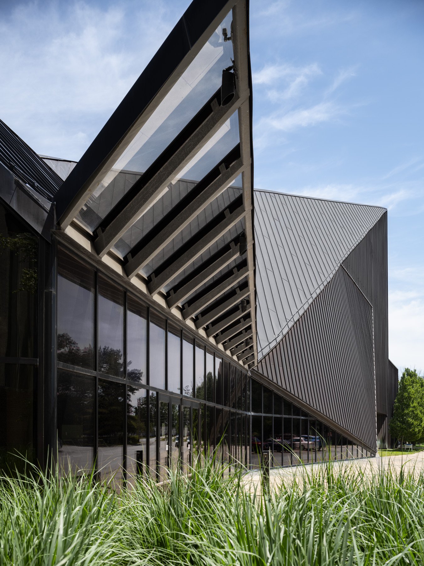 Doudna Fine Arts Center exterior canted glass canopy and curtain wall seen from below by Antoine Predock, Charleston Illinois - architectural photographer